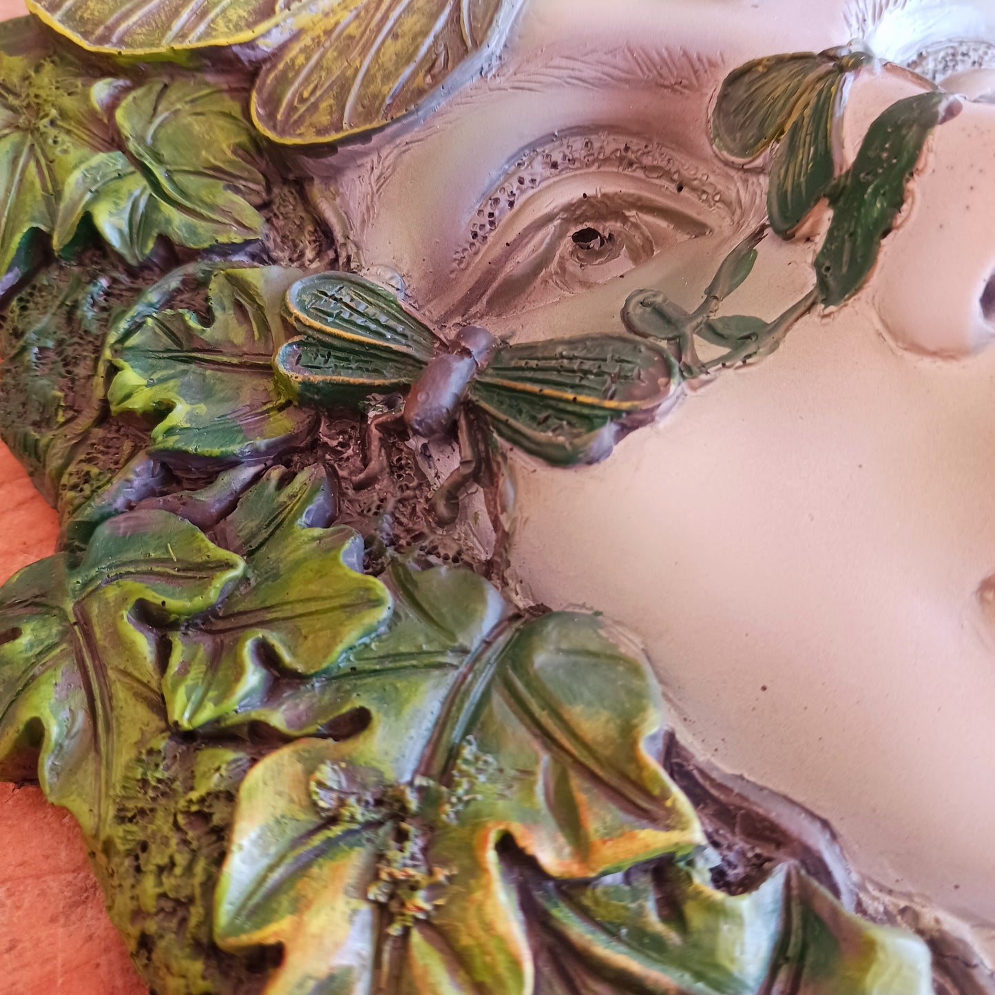 Bring the enchanting beauty of the forest into your home or garden with this stunning Green Goddess Resin Wall Plaque. Beautifully crafted with intricate leafy details, twisting branches and a striking butterfly crown, this decorative plaque captures the spirit of nature, growth and feminine energy.