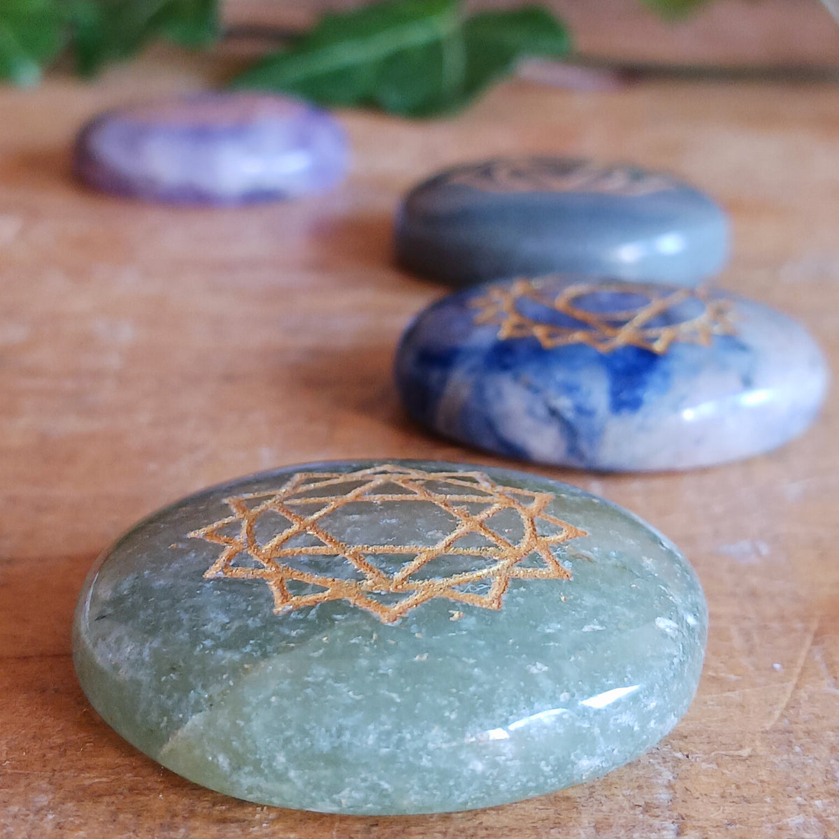 Bring balance and focus to your spiritual practice with this Seven Chakra Crystal Stone Set. Featuring seven natural crystal discs, each engraved with the symbol of a different chakra, this set is ideal for meditation, crystal therapy, yoga and other spiritual practices.