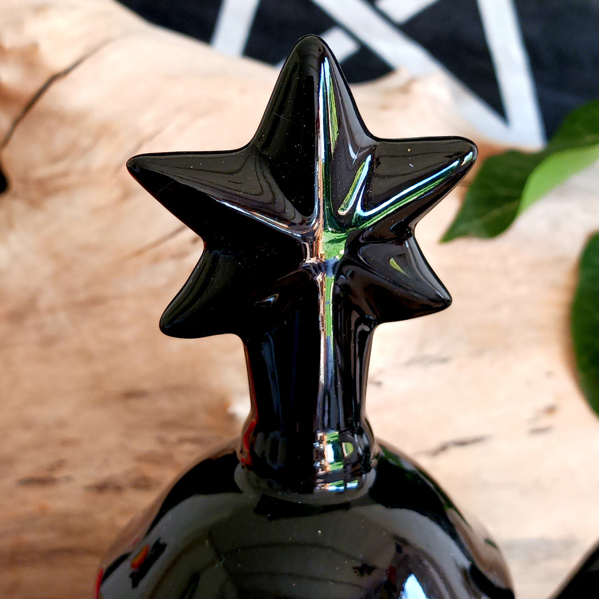Add a touch of celestial magic to tea time with this striking black ceramic teapot, beautifully decorated with moon and star details and finished with a statement star-shaped lid.