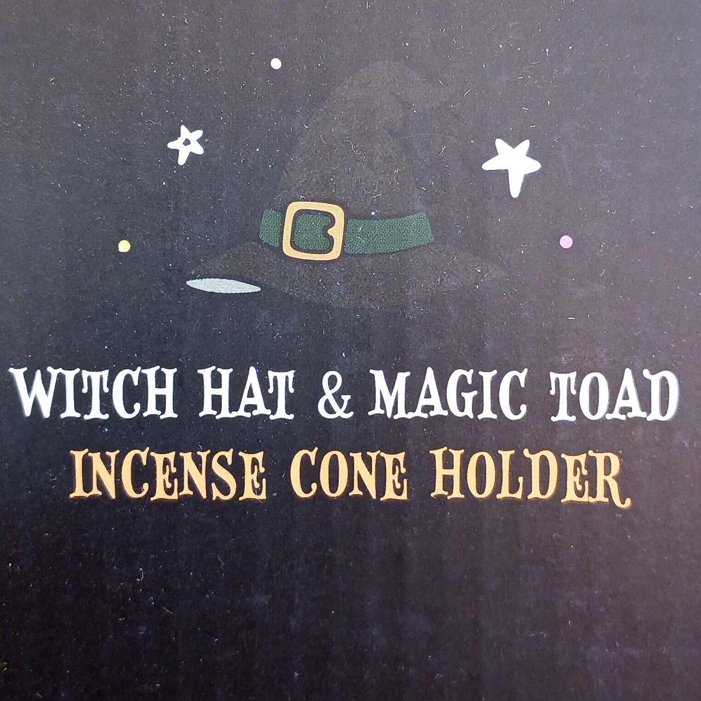 Add a touch of playful magic to your home with this charming Magic Toad & Witch Hat Incense Cone Holder. Made from resin, this quirky incense burner features a classic witch’s hat accompanied by a cute toad, creating a fun and mystical piece of witchy home décor.