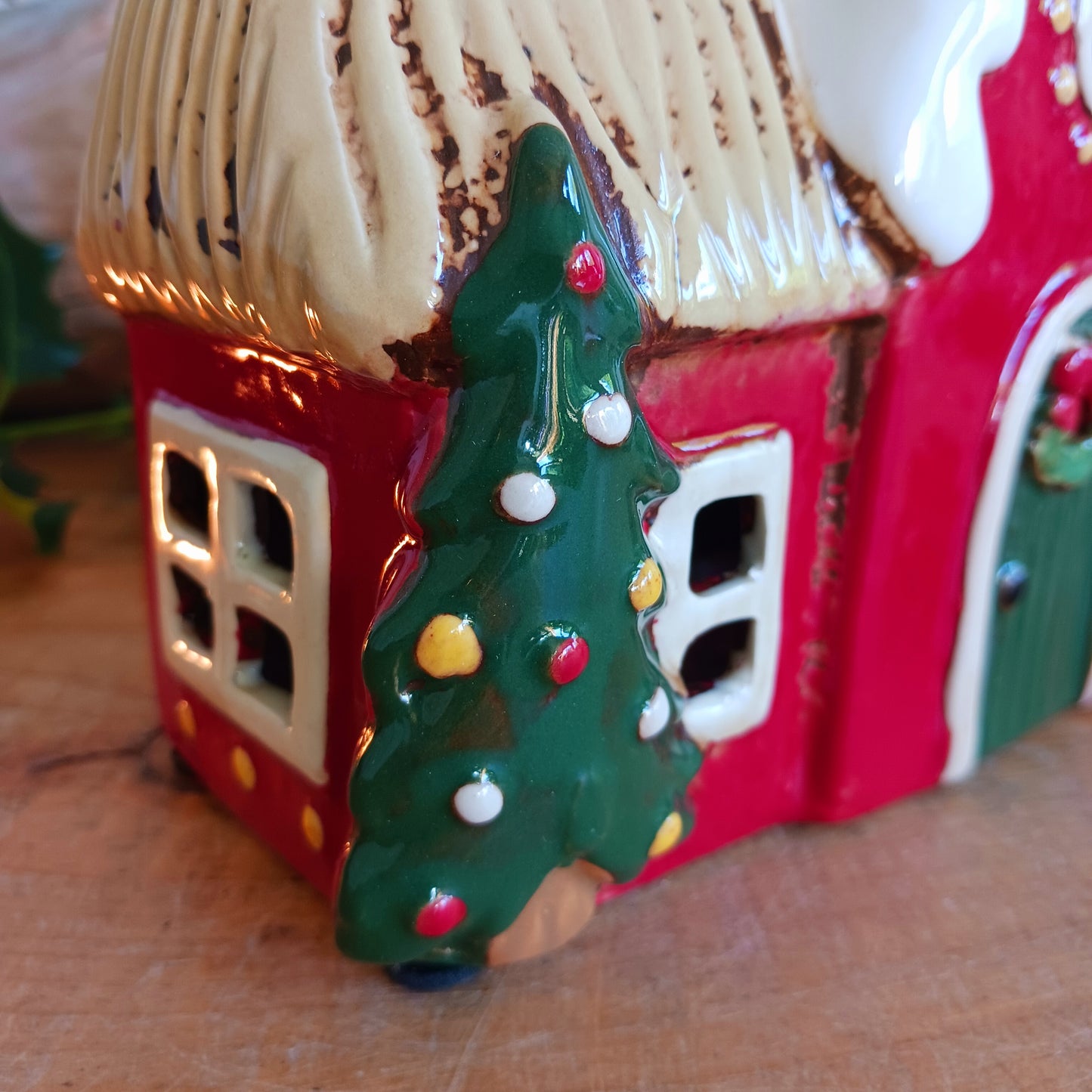 Fill your home with the warmth and wonder of the season with the Village Pottery Christmas Round Window House Tealight Holder, a beautifully handcrafted ceramic creation glowing with festive spirit. Measuring 14.5 x 13.5 x 8.5 cm, this charming house captures the cosy magic of a winter’s night, where light glows softly through the rounded windows like starlight in the snow.