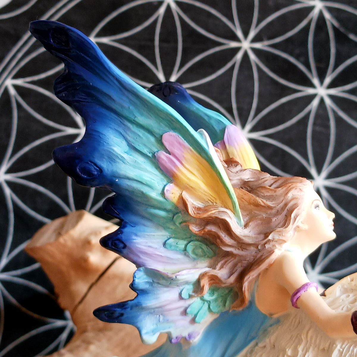 Bring a touch of magical fantasy to your home with this beautifully detailed Fairy Riding A White Wolf Statue from Nemesis Now. The dramatic figurine depicts a graceful fairy riding her loyal white wolf companion as they leap over a flowing stream, creating a striking sense of movement and adventure.