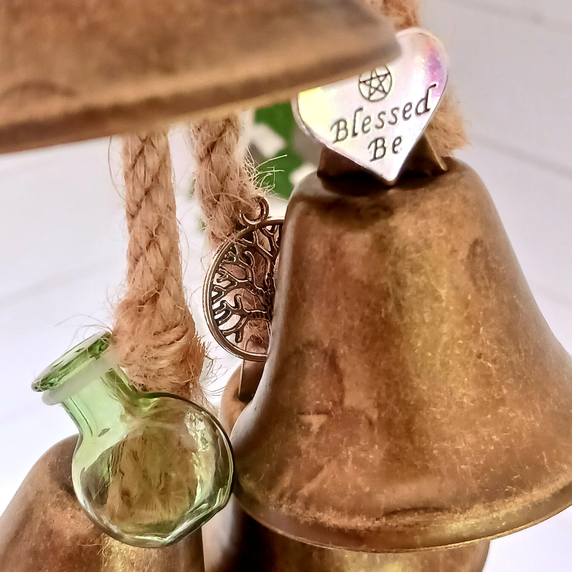 Transform your home into a sanctuary of peace and protection with these enchanting Witches Protection Bells. Each set includes beautifully crafted bells adorned with little charms, offering both visual elegance and soothing auditory magic.