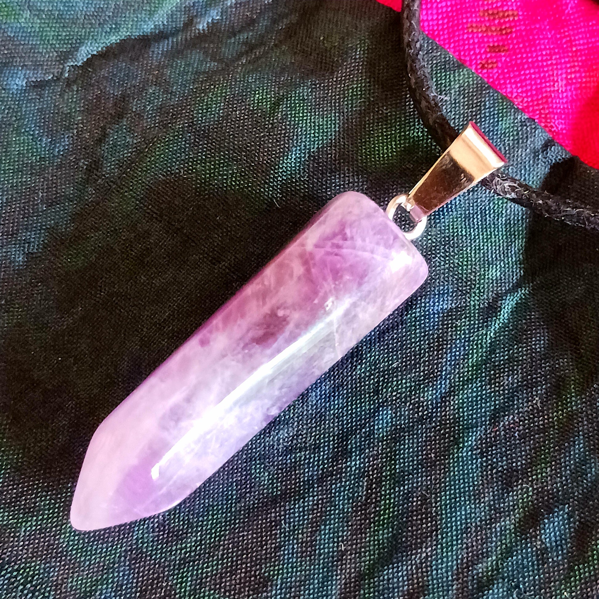  Amethyst, known as the stone of spirituality and peace, ranges in shades from soft lavender to deep violet. Believed to enhance intuition, calm the mind, and connect you to higher consciousness, this crystal pendant is perfect for meditation, energy work, or everyday wear. A meaningful gift for yourself or a loved one.