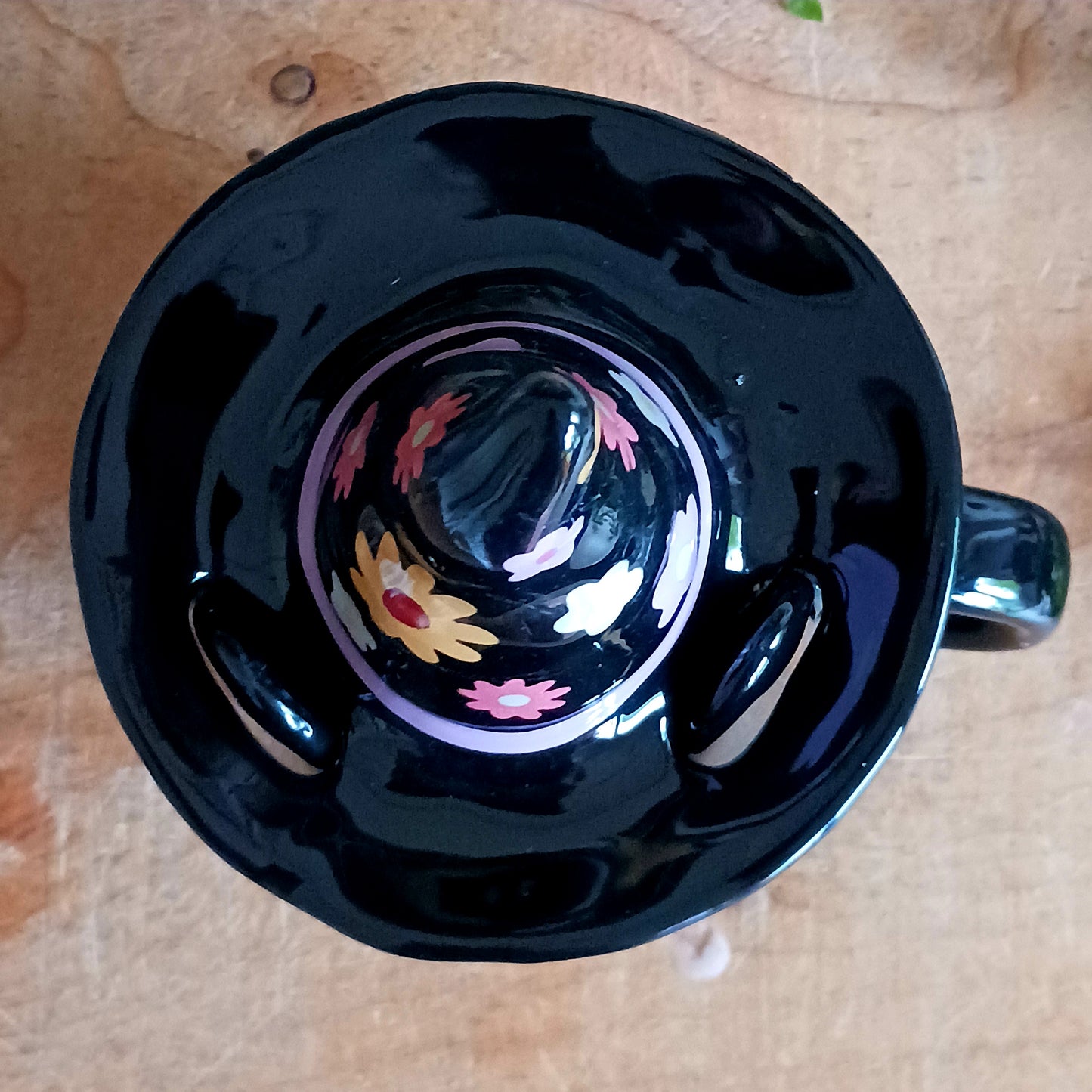 Add a spellbinding touch to your tea or coffee ritual with this groovy ceramic lidded mug, featuring an adorable cat wearing a whimsical witch hat adorned with a funky floral design. The matching ceramic lid helps keep your favourite brew warm, perfect for cosy autumn evenings or magical mornings.