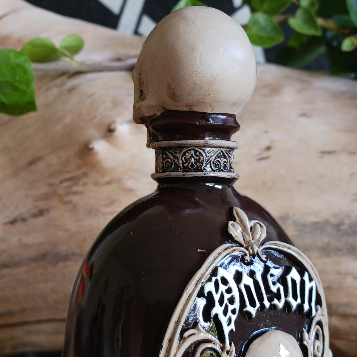 Add a touch of dark gothic elegance to your home with this striking Poison Potion Bottle decorative figurine. Designed to resemble a mysterious deadly potion bottle, it makes a dramatic addition to gothic, alternative, fantasy and Halloween-inspired interiors.