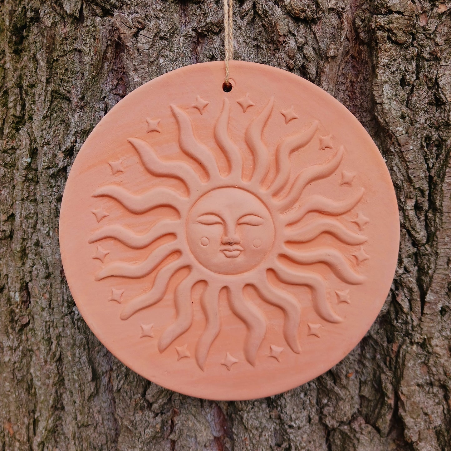 The Terracotta Sun Plaque brings warmth, balance, and positive energy to gardens and sacred outdoor spaces. 