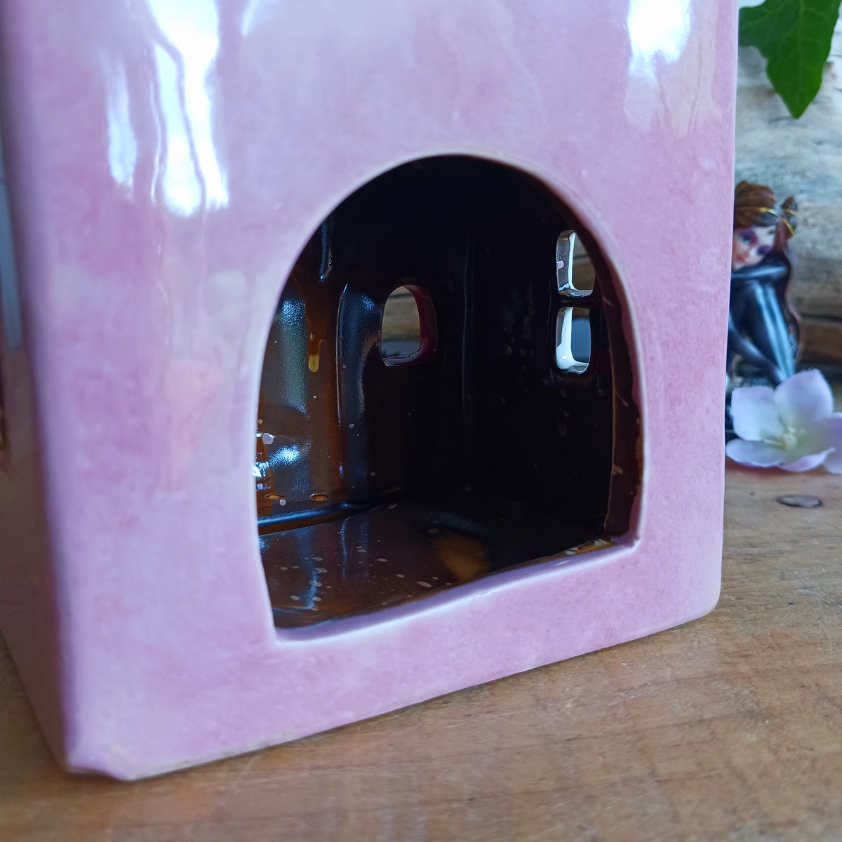 Bring the charm of a quaint village high street into your home with this delightful Village Pottery Wine Bar Tealight Holder. Hand-crafted from ceramic and beautifully hand-painted, this charming miniature wine bar is packed with character and intricate details.