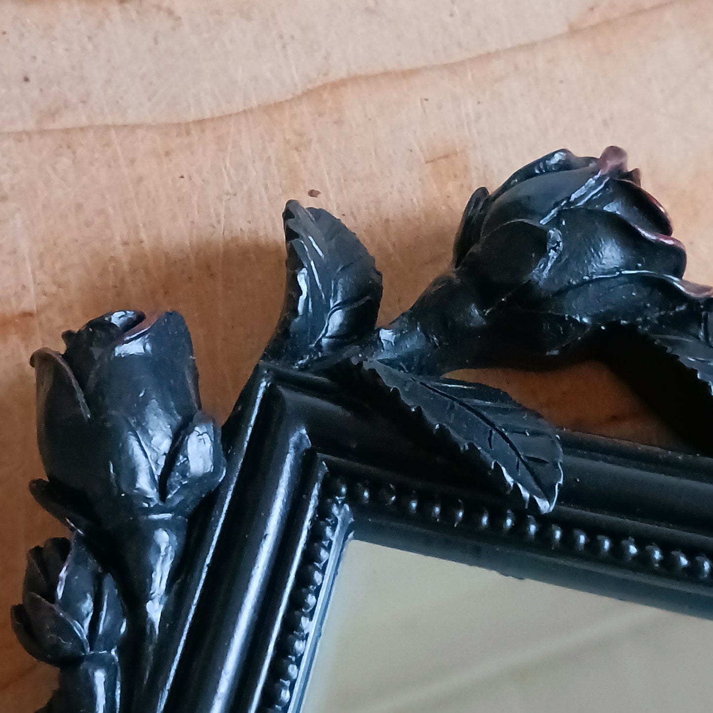 Add a touch of dark romance to your interior with the Rose & Vine Decorative Mirror from the Shades of Alchemy collection. Featuring intricately entwined roses and vines, this striking mirror blends gothic elegance with timeless design.