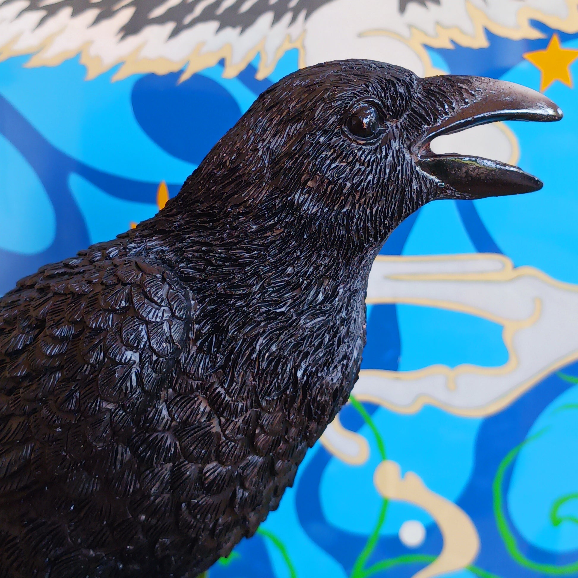 Bring a touch of mystery and nature to your space with this lifelike medium-sized raven figurine. Crafted from high-quality resin, it features meticulously detailed feathers and is perched on a base designed to resemble natural wood. The built-in motion sensor triggers an authentic raven call, adding an interactive and atmospheric element to your décor. Perfect for gothic interiors, nature-inspired arrangements, or as a distinctive gift, this captivating piece blends artistry with surprise for a truly memor