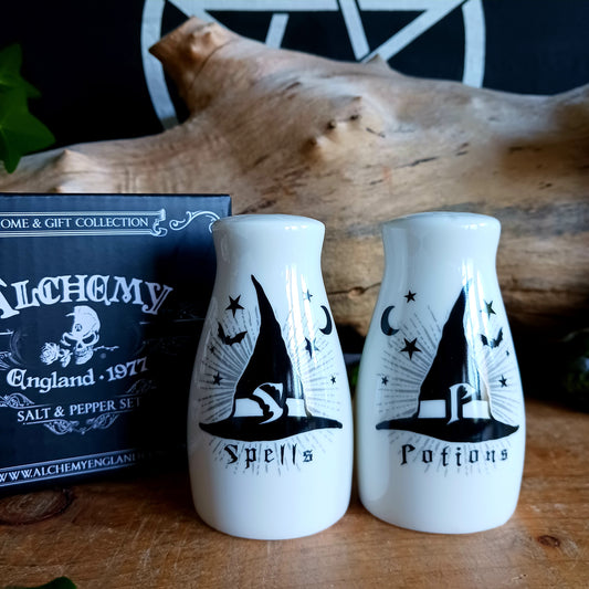 Bring dark elegance and mystical charm to your table with this Gothic-themed fine bone china salt and pepper shaker set by Alchemy England. Designed for lovers of witchy aesthetics and magical symbolism, this unique set features an engraved “S” for Spells and “P” for Potions, making it both functional and conversation-starting.