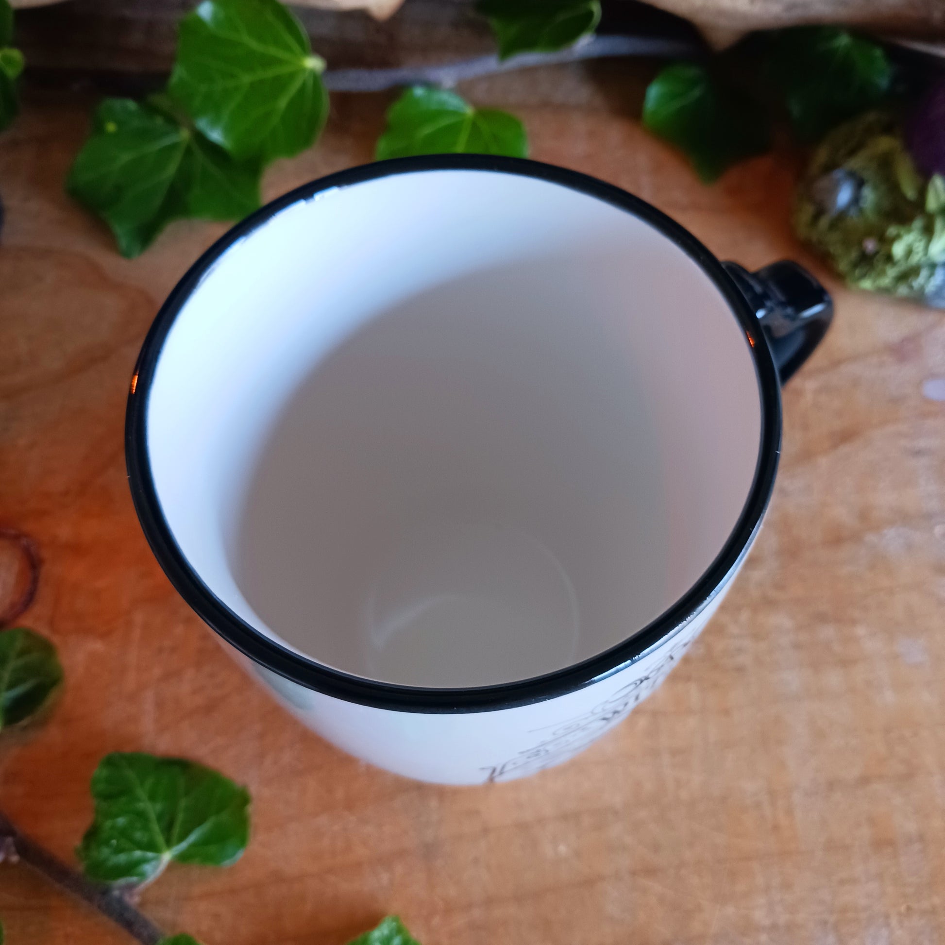 When the moon rises and the stars awaken, the Midnight Witch takes flight. Glide through twilight skies with this enchanting Witch Mug by Alchemy, a perfect blend of gothic charm and whimsical magic.