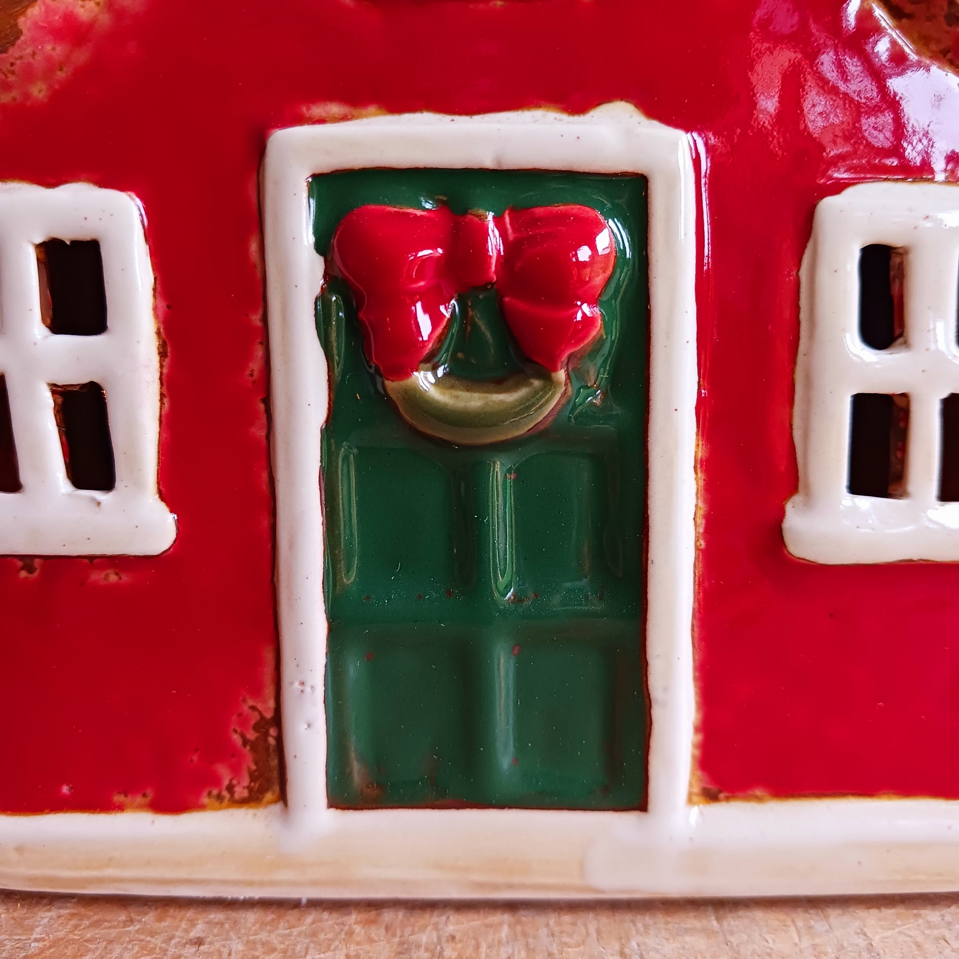 Bring timeless festive charm to your home with this hand-crafted Christmas Traditional House Tealight Holder from The Village Pottery. Carefully shaped in ceramic and finished with rustic detailing, it captures the magic of a snow-covered village scene. 