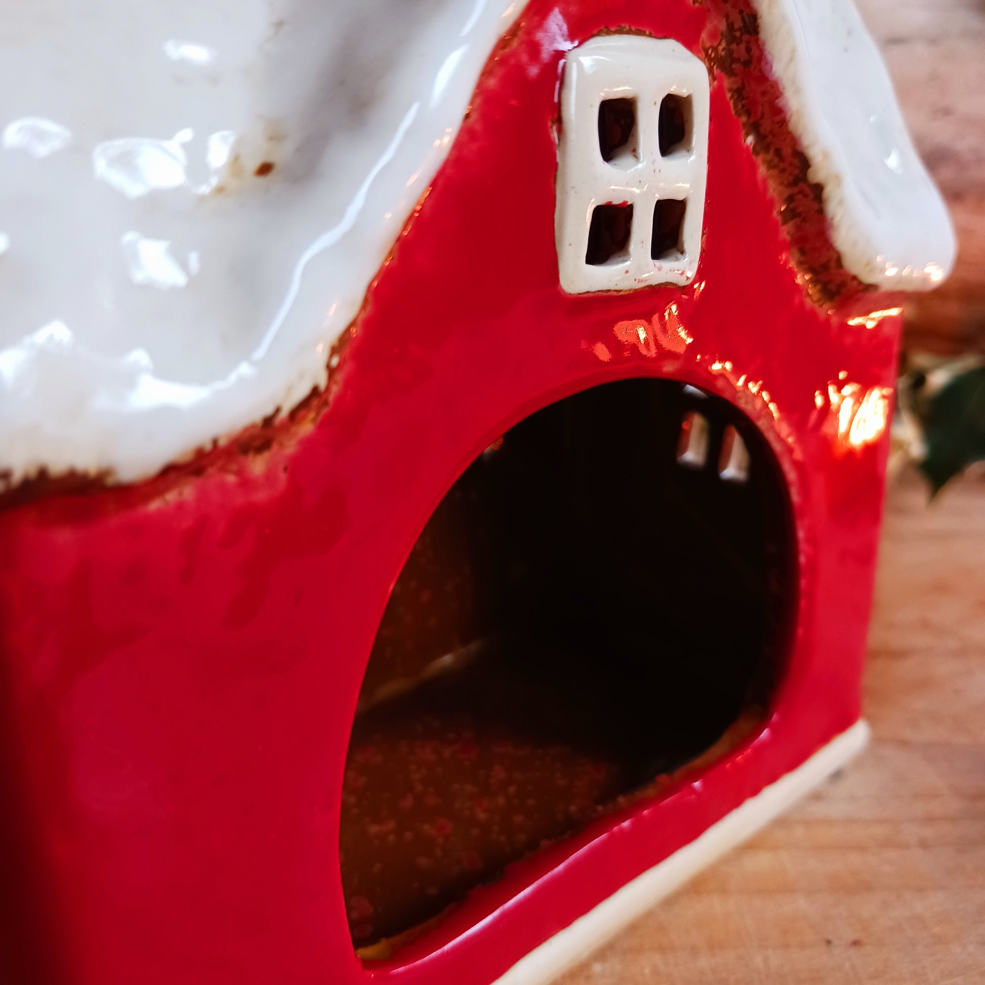 Bring timeless festive charm to your home with this hand-crafted Christmas Traditional House Tealight Holder from The Village Pottery. Carefully shaped in ceramic and finished with rustic detailing, it captures the magic of a snow-covered village scene. 