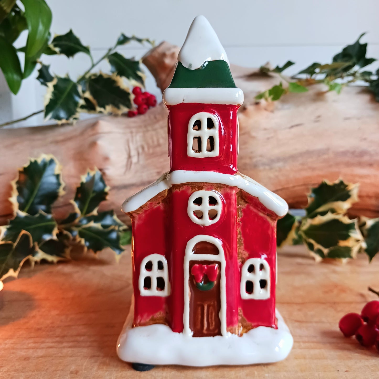 Handcrafted in the Village Pottery workshop, this charming Little Christmas Church Ceramic Tealight Holder brings traditional festive magic into your home. Made from high-quality ceramic with intricate detailing, it captures the timeless beauty of a snow-covered village church.