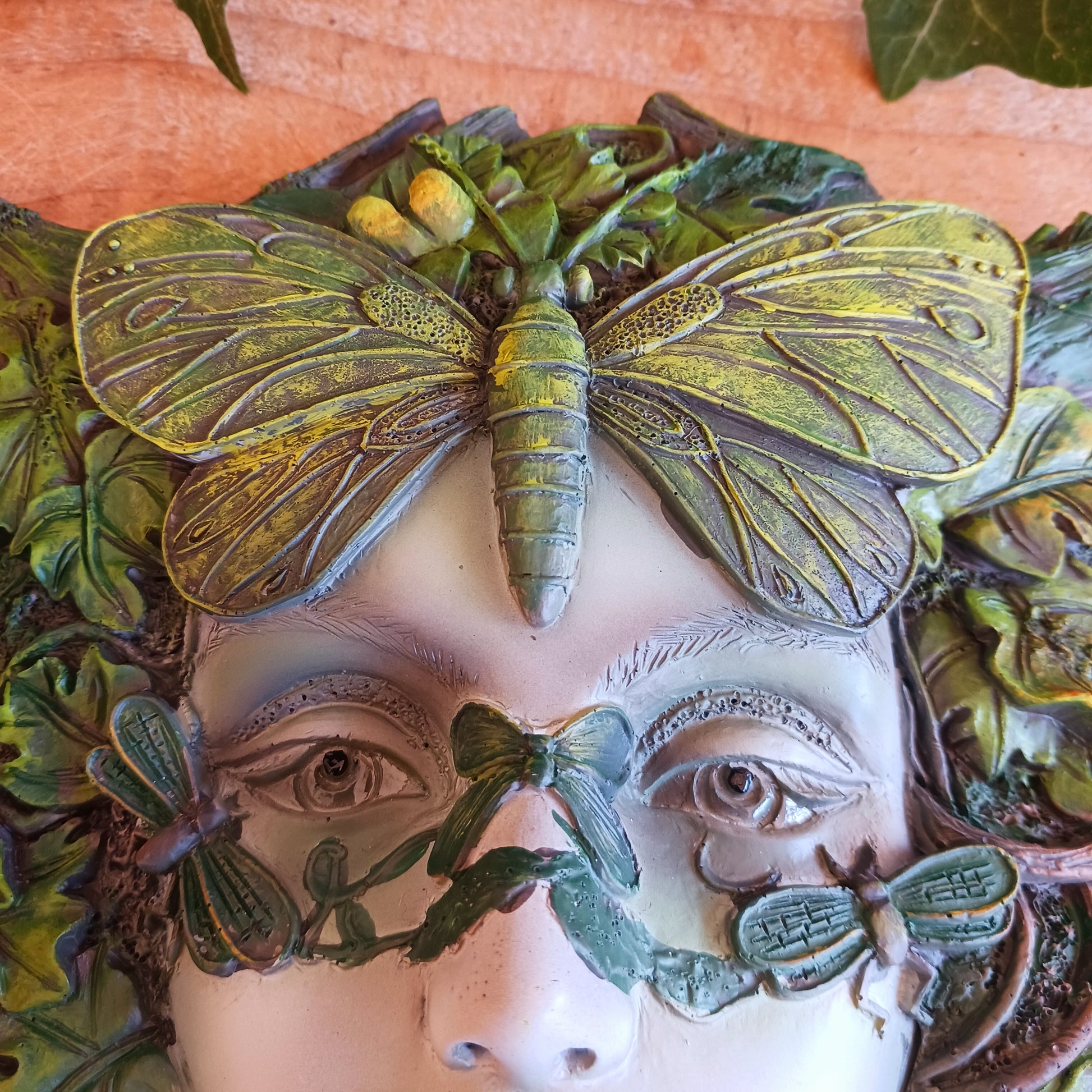 Bring the enchanting beauty of the forest into your home or garden with this stunning Green Goddess Resin Wall Plaque. Beautifully crafted with intricate leafy details, twisting branches and a striking butterfly crown, this decorative plaque captures the spirit of nature, growth and feminine energy.