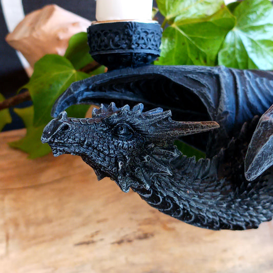 Bring bold fantasy energy into your space with this striking Gothic Dragon Candle Holder, designed to captivate and impress. Featuring a powerful dragon frozen mid-flight, this dramatic piece transforms any room into a mystical sanctuary.