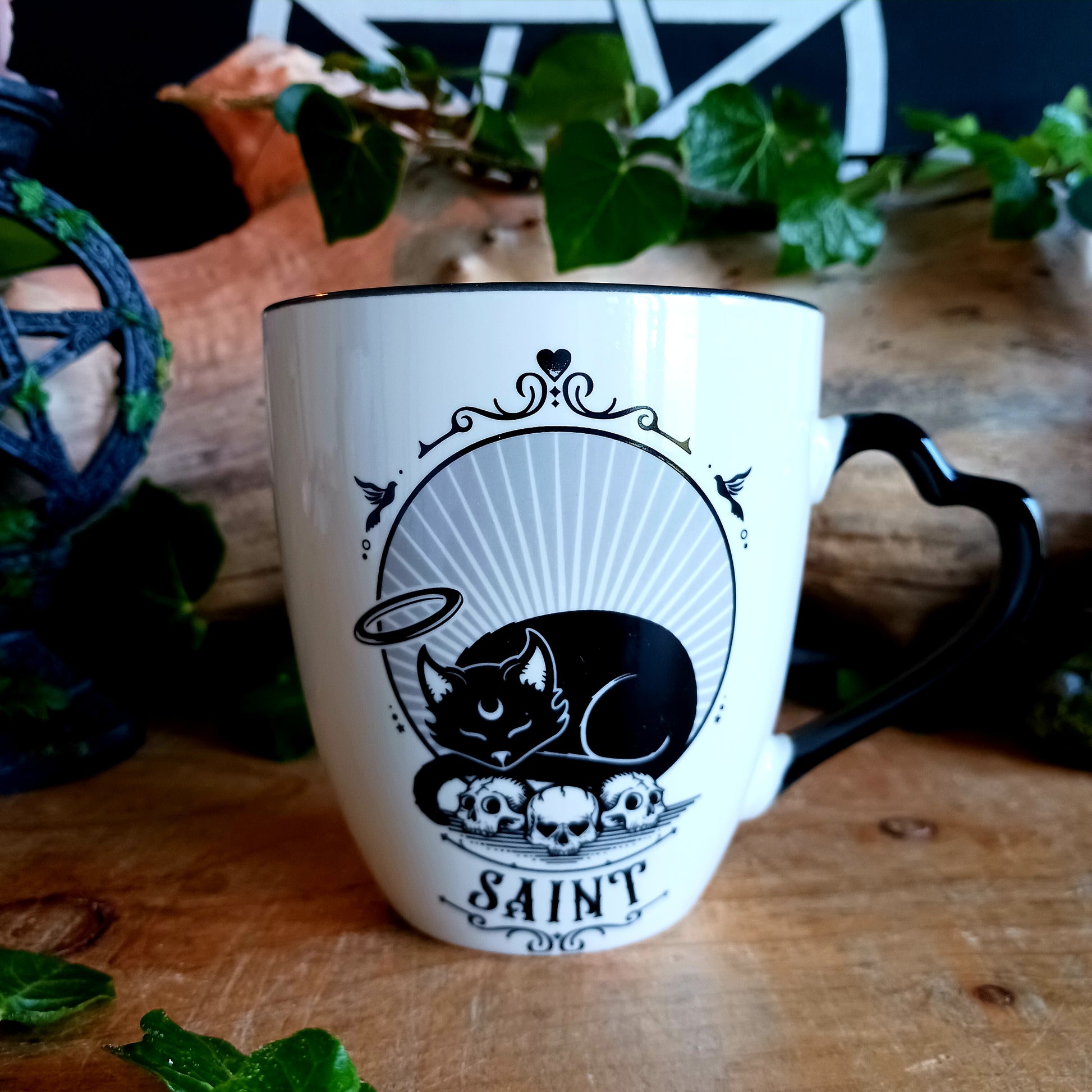 In a world where every cat has two sides—the purring saint basking in sunlight and the midnight prowler plotting chaos—balance is everything. The Saint or Sinner Cat Mug celebrates that duality with charming, original artwork that lets you choose your mood with every sip.