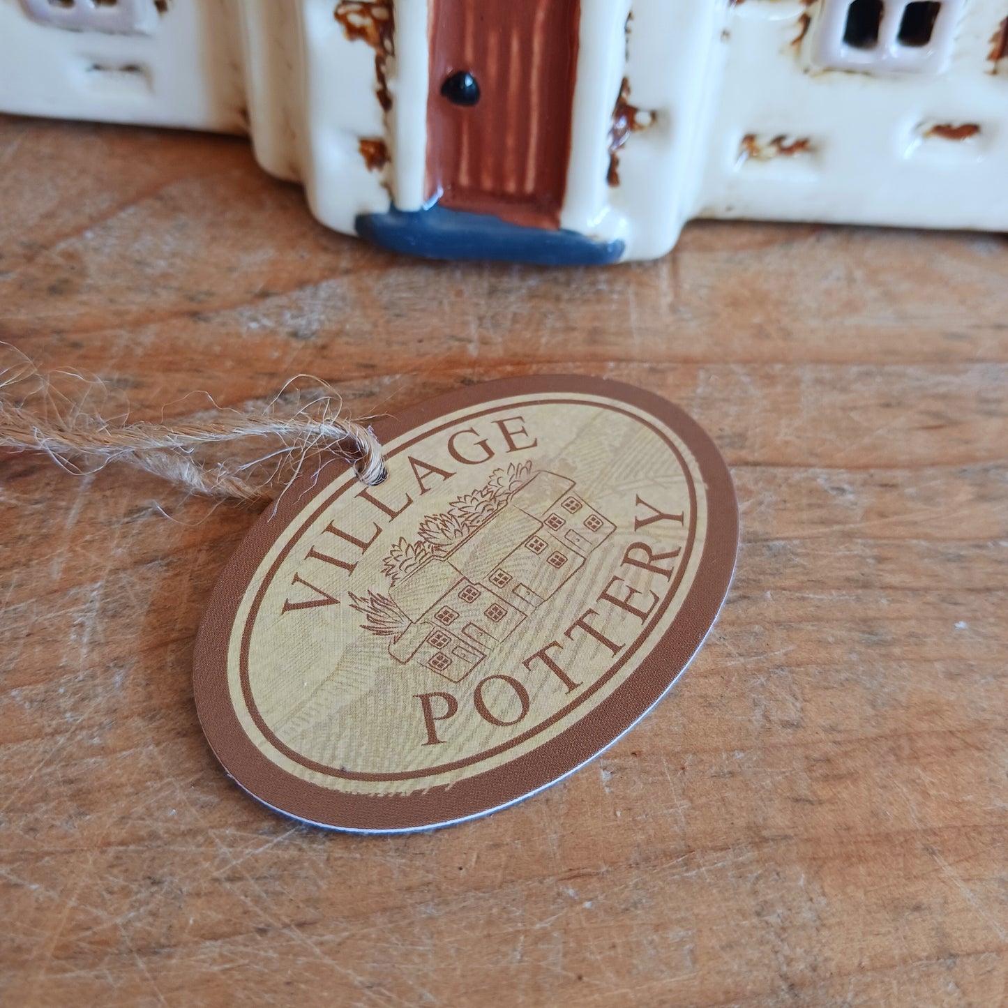 Add timeless charm to your home with the Village Pottery Steeple Church Tealight Holder. Beautifully hand-finished, each ceramic piece is unique and full of character. When a tealight is placed inside, a warm, cosy glow shines through the delicate church windows, creating a magical ambiance. 