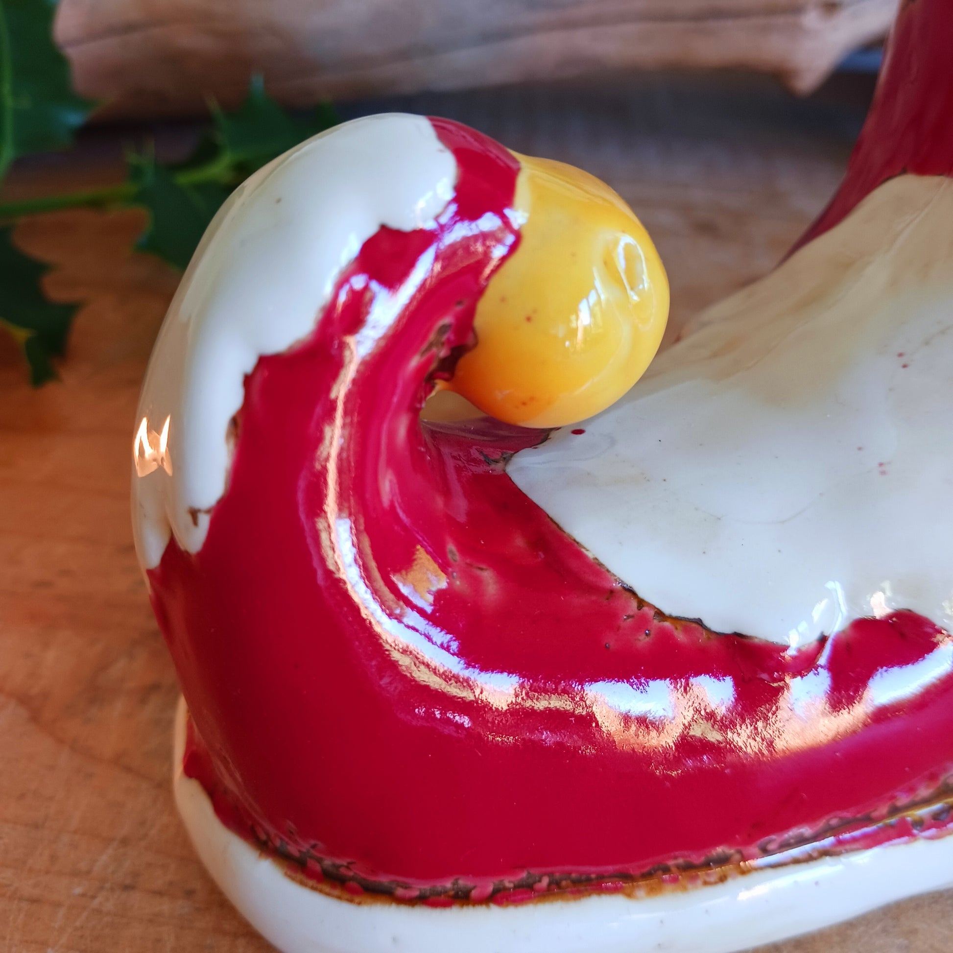 Step into the world of festive enchantment with the Village Pottery Christmas Elf Boot House Tealight Holder, a playful handcrafted ceramic creation bursting with Christmas spirit. Measuring 16 x 16 x 9.5 cm, this delightful piece takes the shape of a cheerful elf’s boot turned into a cosy little house, complete with twinkling windows and snowy details.