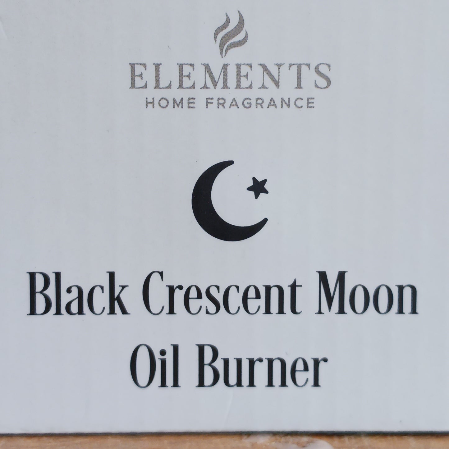 Bring a touch of midnight magic to your home with this enchanting black crescent moon oil burner. Crafted with celestial star cut-outs, it casts a soft, glowing light while infusing the air with your favorite fragrance oil. The hanging bowl design adds a whimsical charm, making it perfect for creating a cozy, dreamy atmosphere in any space. Ideal for relaxing evenings, meditation, or simply adding a mystical statement piece to your décor.