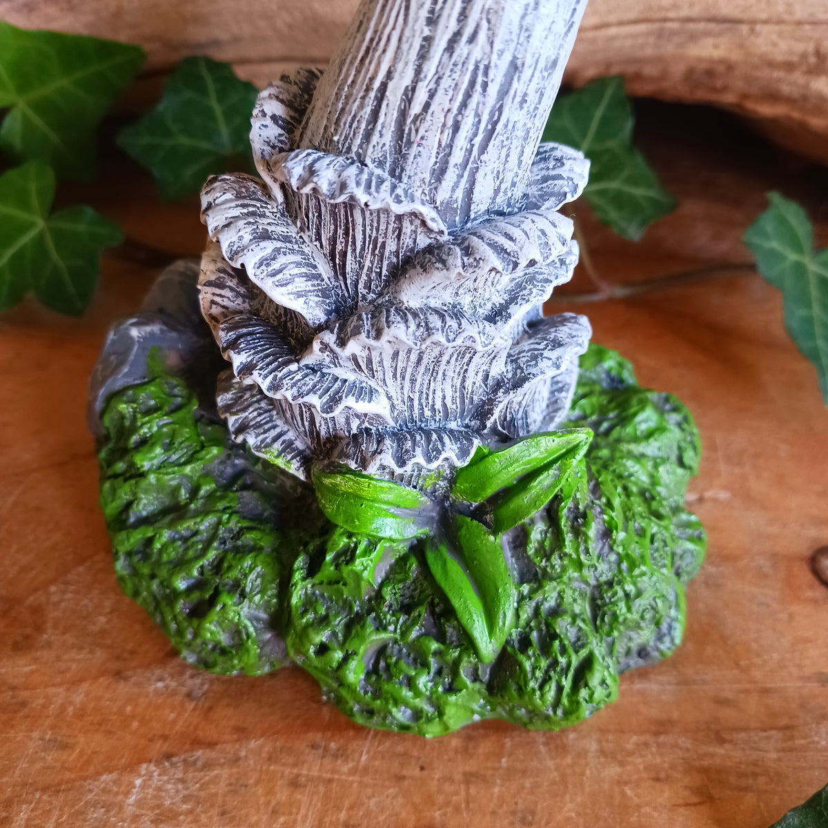 Bring a touch of magic and whimsical charm to your home with Twizzle Tumblethorne, a wonderfully quirky purple mushroom sculpture perfect for lovers of fantasy, fairies and nature-inspired decor.