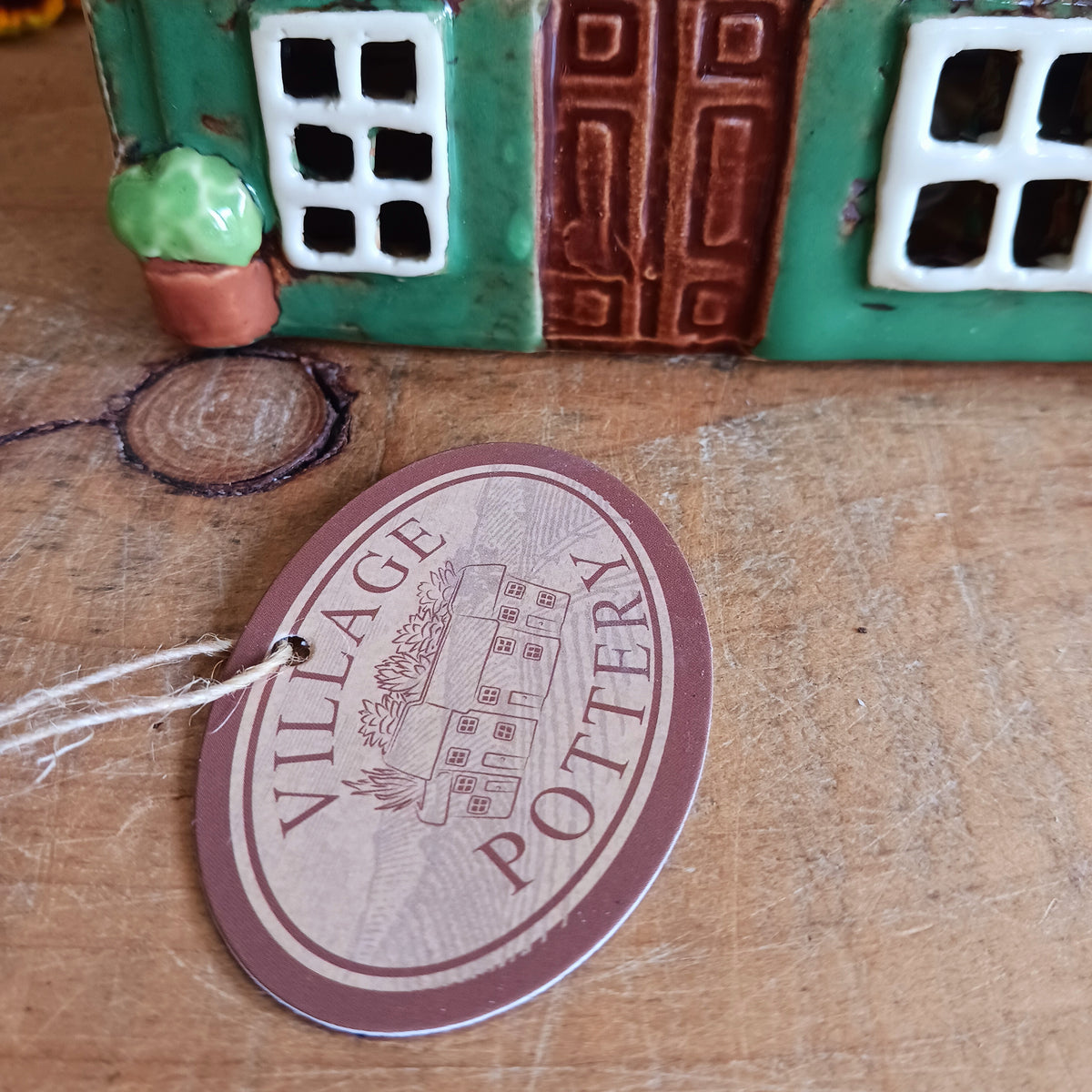 Bring a little British village charm into your home with this delightful Village Tavern Tealight Holder, beautifully hand-crafted in ceramic and hand-painted with charming, characterful details.