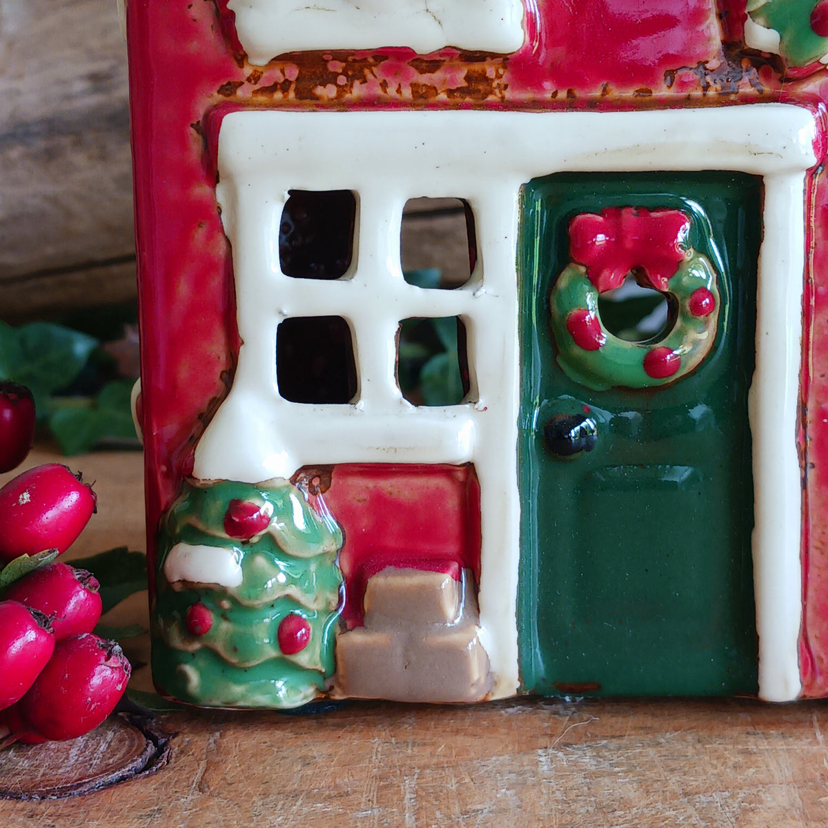 Create a cosy Christmas village scene with this charming Village Pottery Christmas Post Office Tealight Holder. Beautifully detailed as a traditional snowy village post office, it features a snow-covered roof, a post box and a delightful robin decoration for a wonderfully festive look.