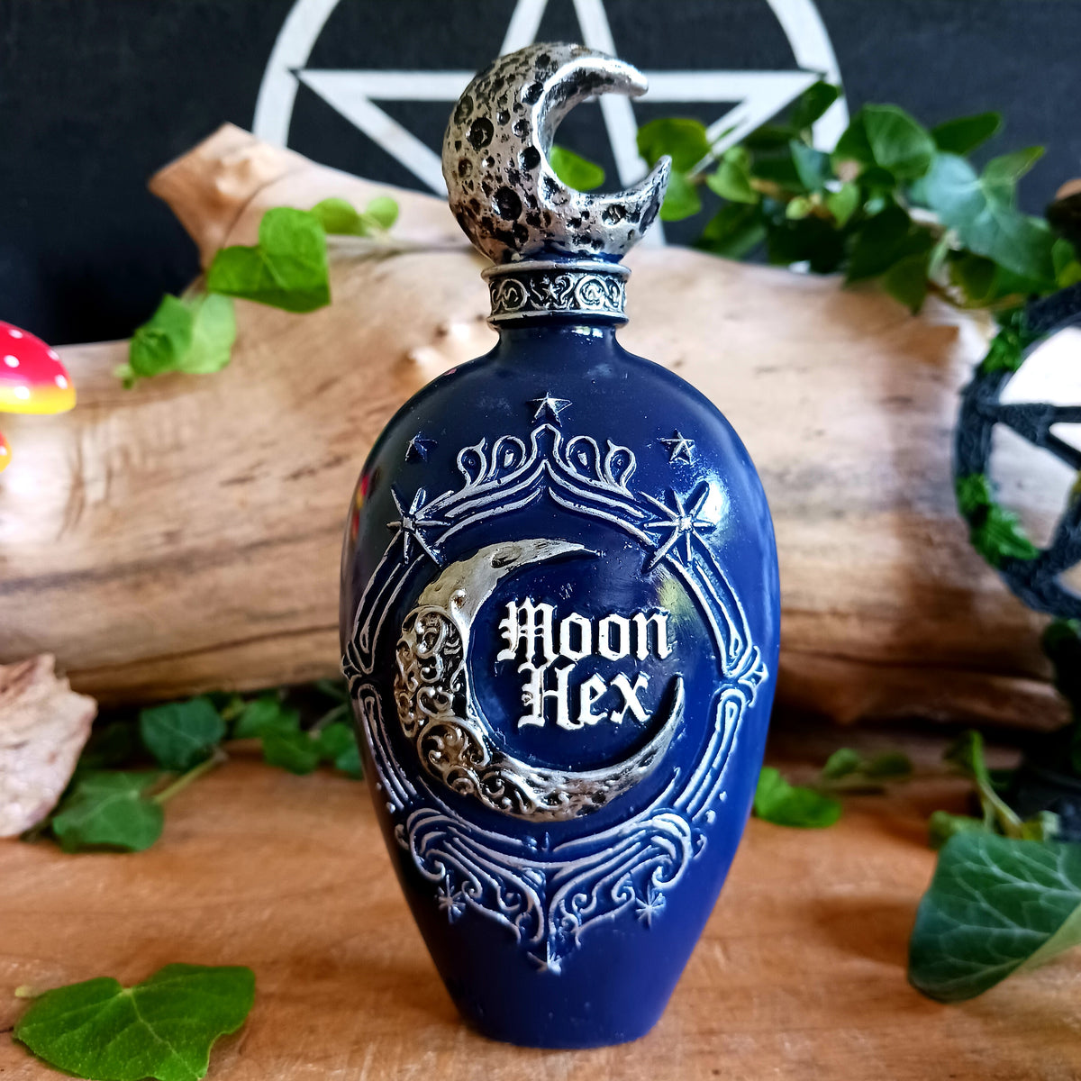 Embrace the enchanting magic of the moon with this Hex Moon Celestial Potion Bottle Figurine, a captivating collectible for lovers of gothic, fantasy and celestial-inspired décor.