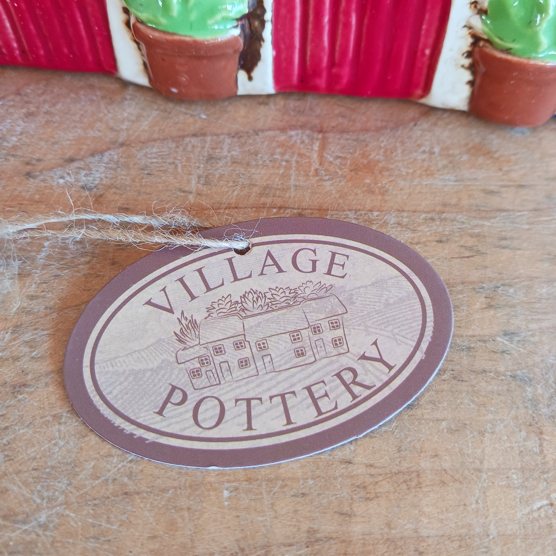 Nestled at the edge of a quiet enchanted village, The Stables tealight house by Village Pottery glows with a soft, grounding warmth. Crafted from ceramic and measuring 17x8x8cm, this rustic stable invites candlelight to flicker through its windows like a lantern for wandering spirits and kindred souls.