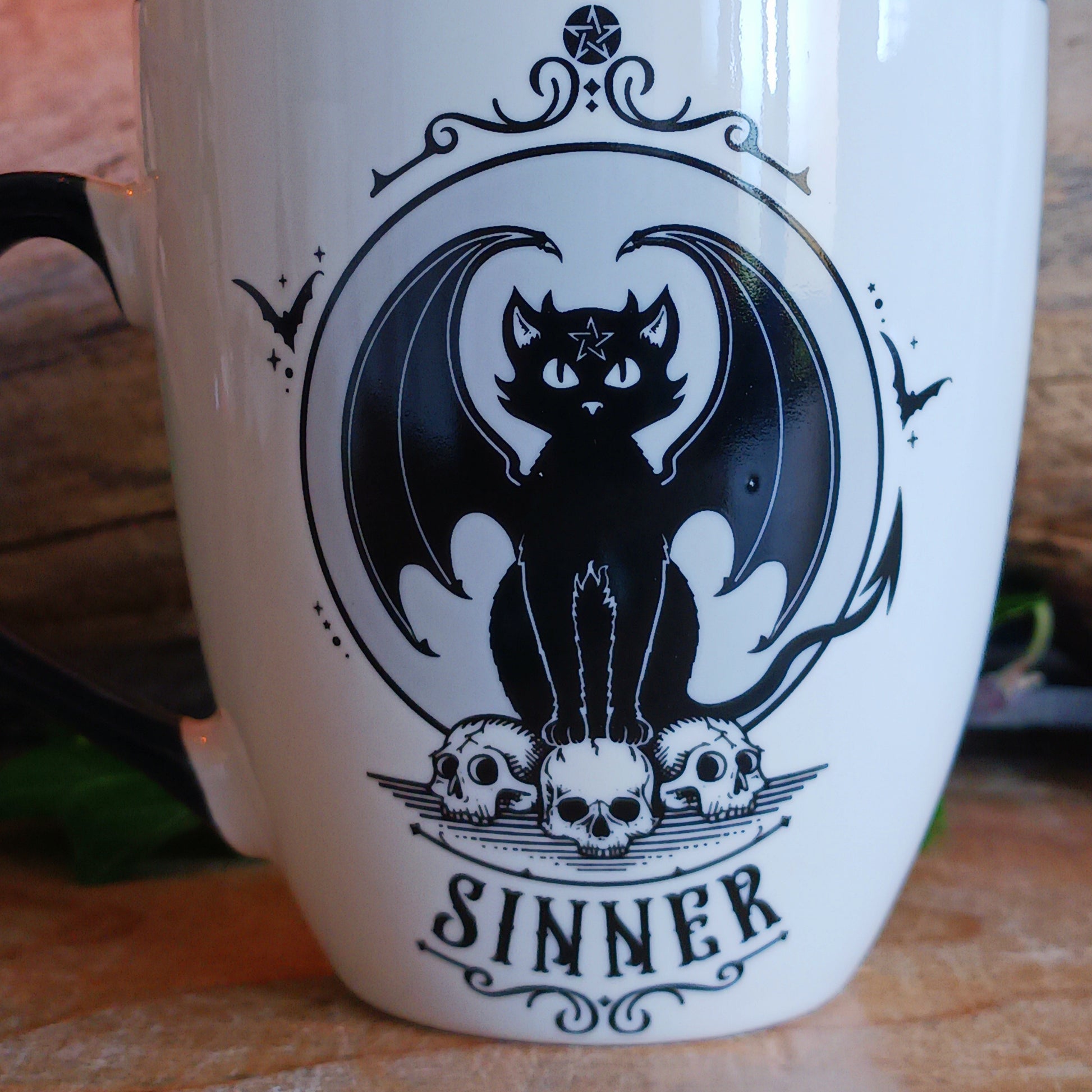 In a world where every cat has two sides—the purring saint basking in sunlight and the midnight prowler plotting chaos—balance is everything. The Saint or Sinner Cat Mug celebrates that duality with charming, original artwork that lets you choose your mood with every sip.