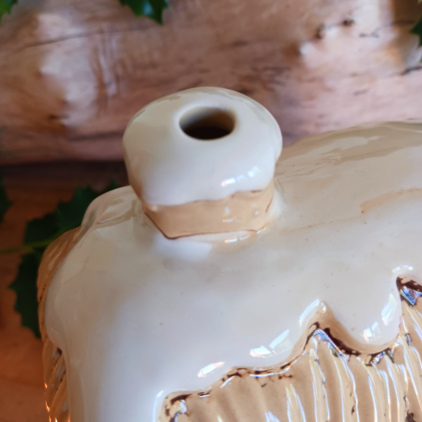 Bring timeless festive charm into your home with the Village Pottery Christmas Thatched Roof House Tealight Holder, a handcrafted ceramic cottage glowing with the spirit of the season. Measuring 17 x 12.5 x 8.5 cm, this enchanting piece captures the essence of a peaceful winter’s night — where golden candlelight flickers through snowy windows beneath a soft thatched roof.