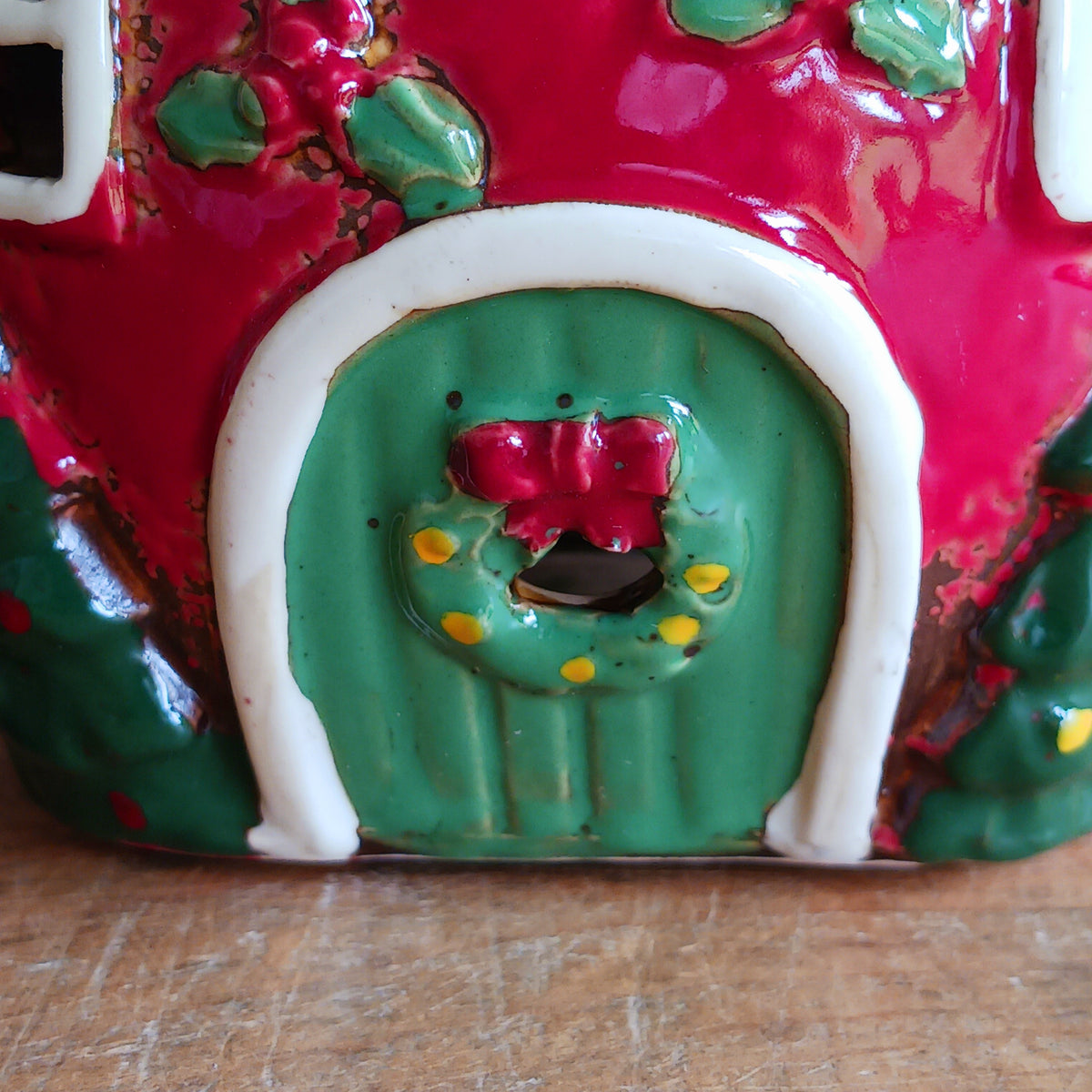 Add a touch of charm and character to your festive display with the Village Pottery Xmas Teapot House Tealight. Combining the familiar shape of a traditional teapot with the appearance of a miniature Christmas house, this unusual decorative tealight holder makes a delightful addition to your seasonal décor.