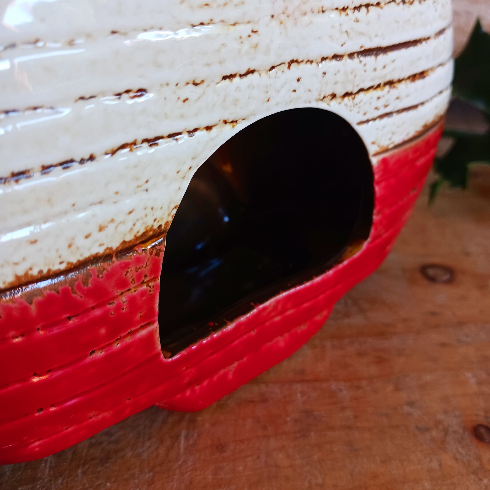 Step into a cosy winter wonderland with the Village Pottery Christmas Caravan Tealight Holder, a heart-warming piece crafted with love and festive magic. Measuring 13.5 x 18.5 x 7 cm, this hand-painted ceramic caravan glows with Christmas cheer, ready to light up your home with a gentle, enchanting flicker.