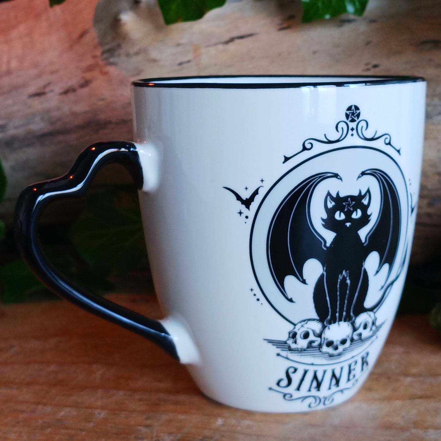 In a world where every cat has two sides—the purring saint basking in sunlight and the midnight prowler plotting chaos—balance is everything. The Saint or Sinner Cat Mug celebrates that duality with charming, original artwork that lets you choose your mood with every sip.