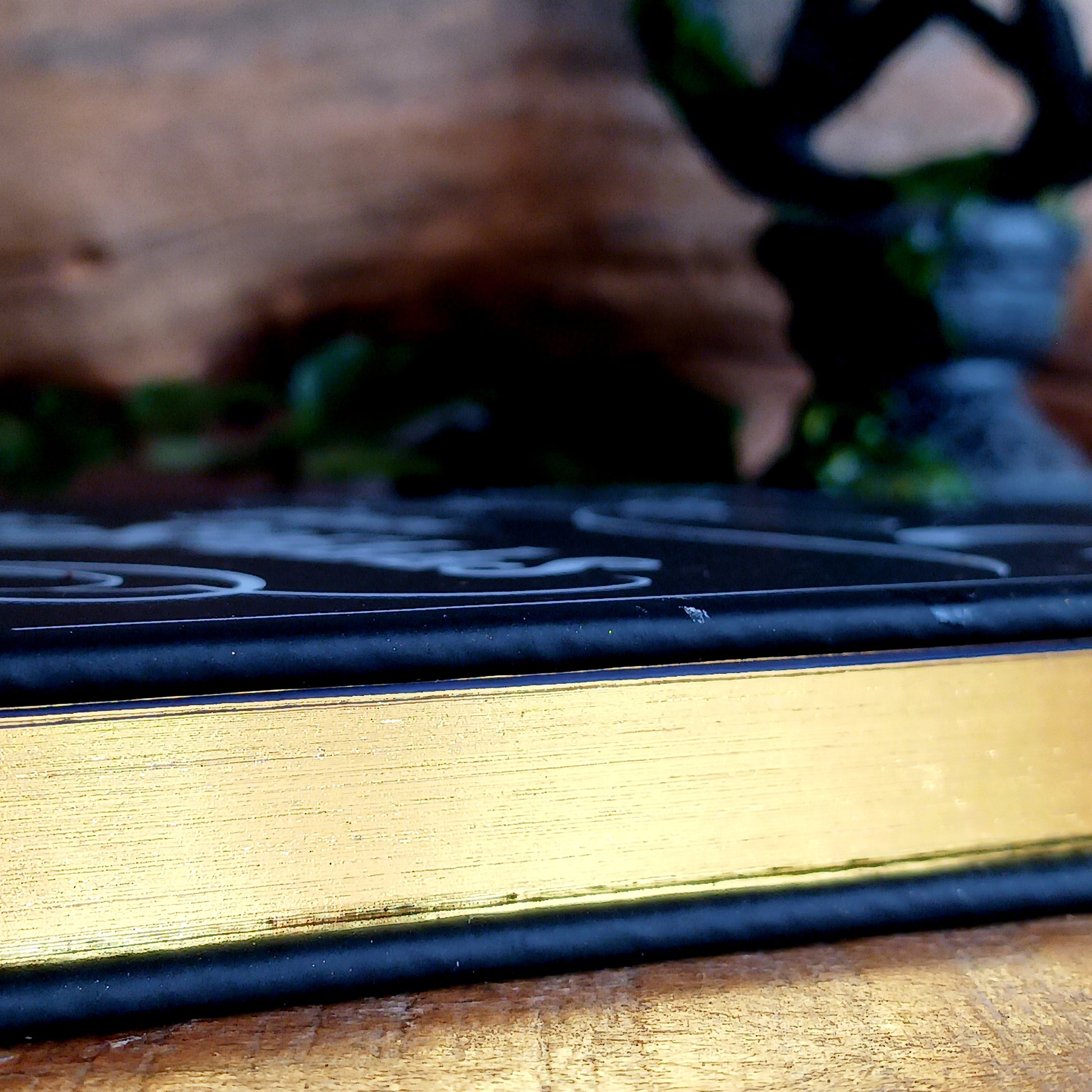 Capture your thoughts, spells, stories, or midnight musings in this beautifully styled&nbsp;A5 “Book of Spells” notebook. Designed with a gothic, mystical aesthetic, this notebook feels like it came straight from a wizard’s library—perfect for writers, witches, creatives, and lovers of dark academia stationery.