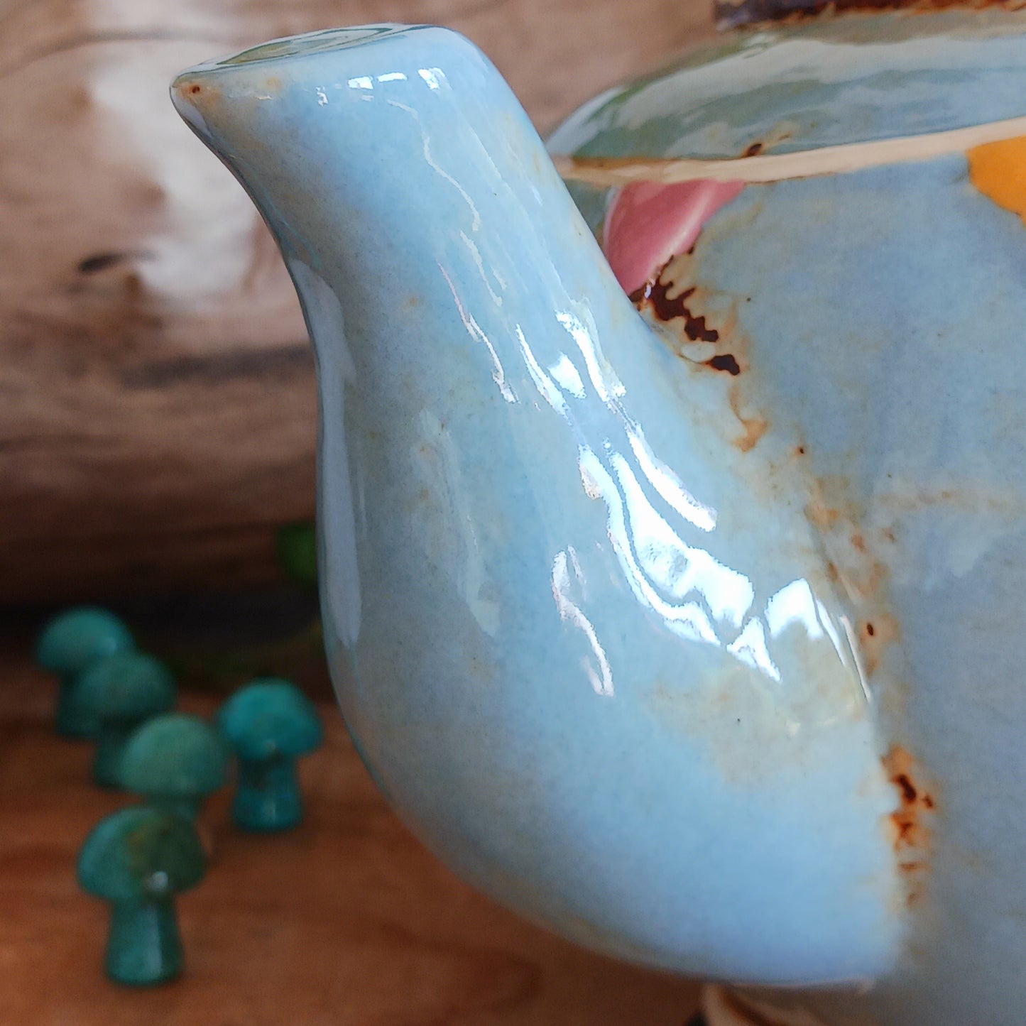 Create a warm and cosy atmosphere in your home with this charming Round Teapot Tealight Holder from the Village Pottery Collection. Crafted in a unique teapot shape, this ceramic tealight holder makes a delightful decorative piece for shelves, windowsills, or side tables. Simply place a tealight inside to enjoy a soft, glowing ambience.