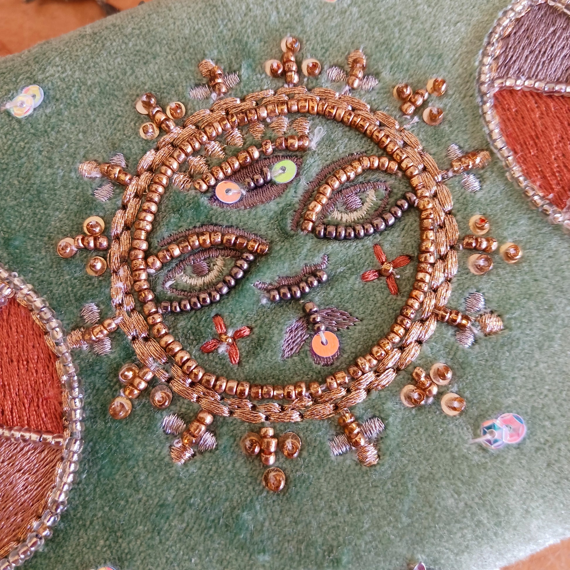 Elegant green triple moon velvet box with fine embroidery and beads. Perfect for jewellery, tarot cards, and crystals. Secure strap closure for treasured items.