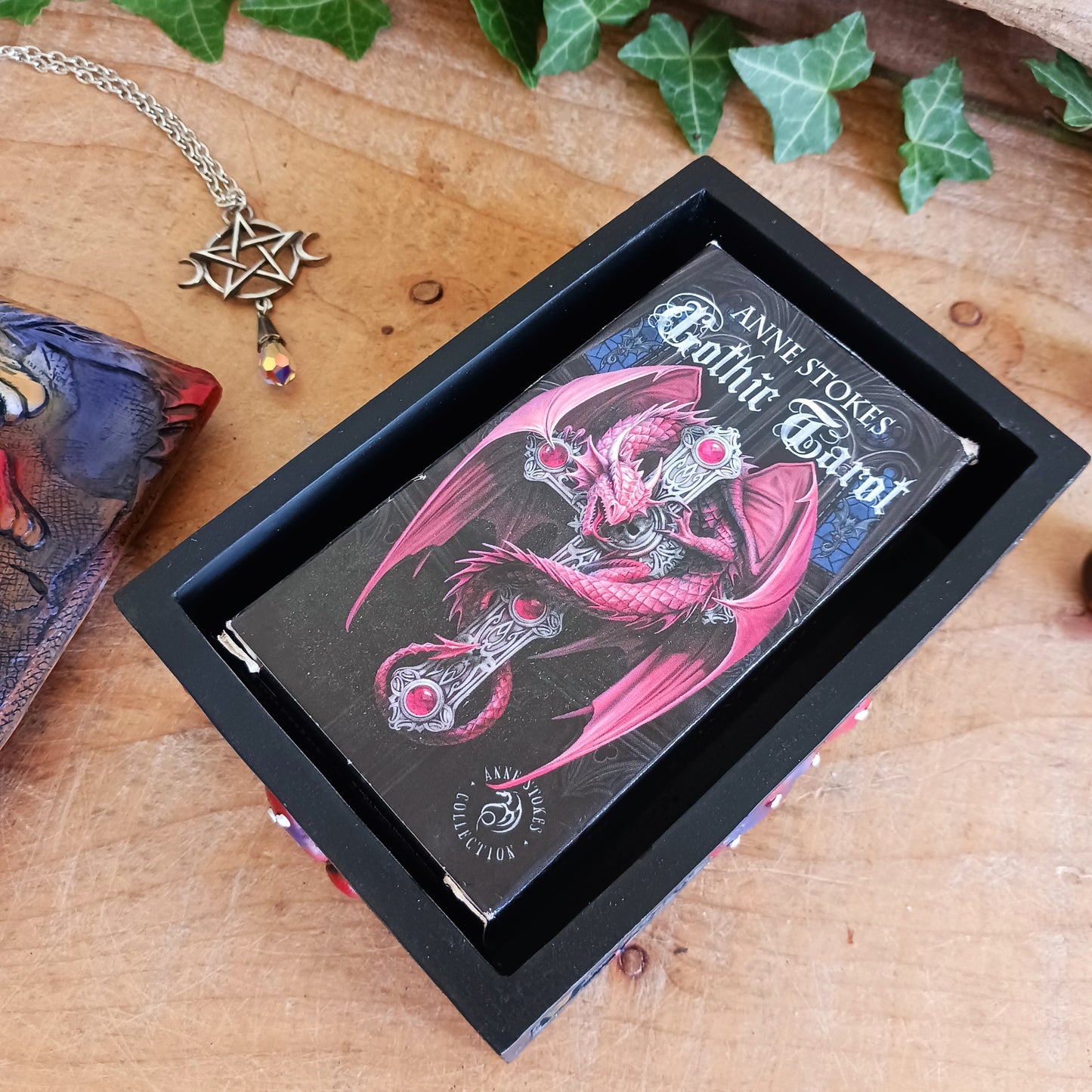 Bring a touch of mystery and magic to your home with this beautiful trinket box, featuring intricate hand-painted mushroom illustrations set against a dreamy backdrop. Perfect for modern, bohemian, or eclectic spaces, it’s as functional as it is enchanting.