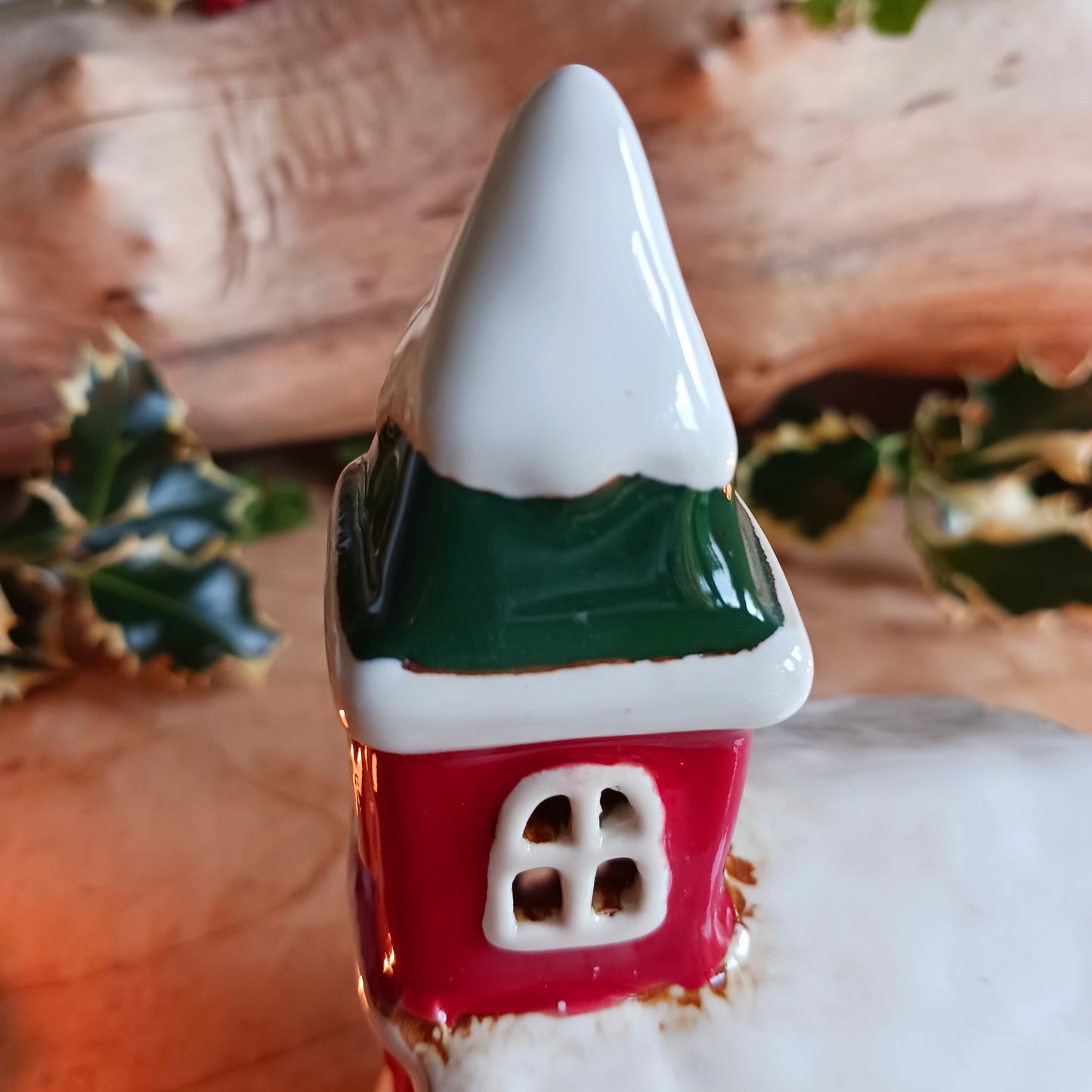 Handcrafted in the Village Pottery workshop, this charming Little Christmas Church Ceramic Tealight Holder brings traditional festive magic into your home. Made from high-quality ceramic with intricate detailing, it captures the timeless beauty of a snow-covered village church.