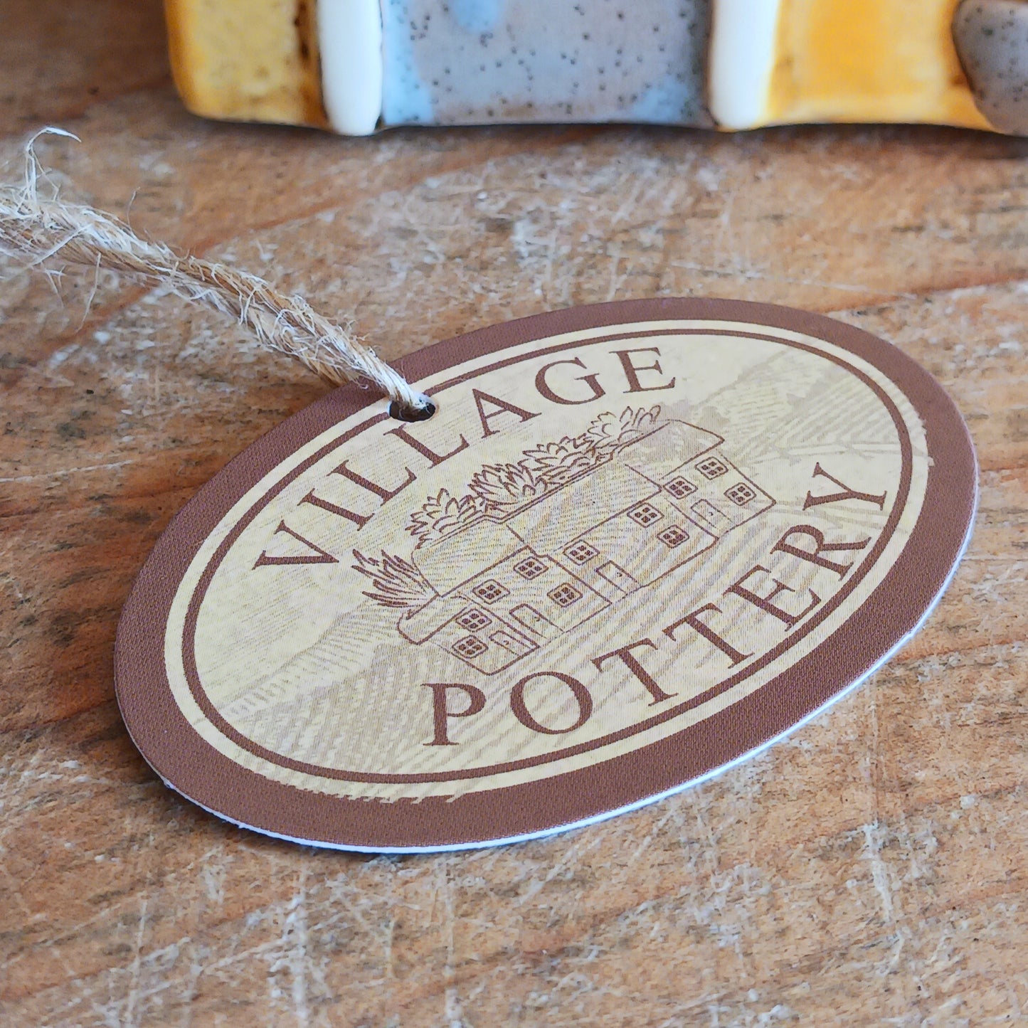 Transform your home into a warm and inviting sanctuary with the Village Pottery Tea Rooms Tealight Holder. Crafted from quality ceramic, this charming rustic piece creates a cosy, nostalgic glow when lit with a tealight. More than just a candle holder, it doubles as a delightful decorative ornament for your coffee table, shelf, or windowsill. 