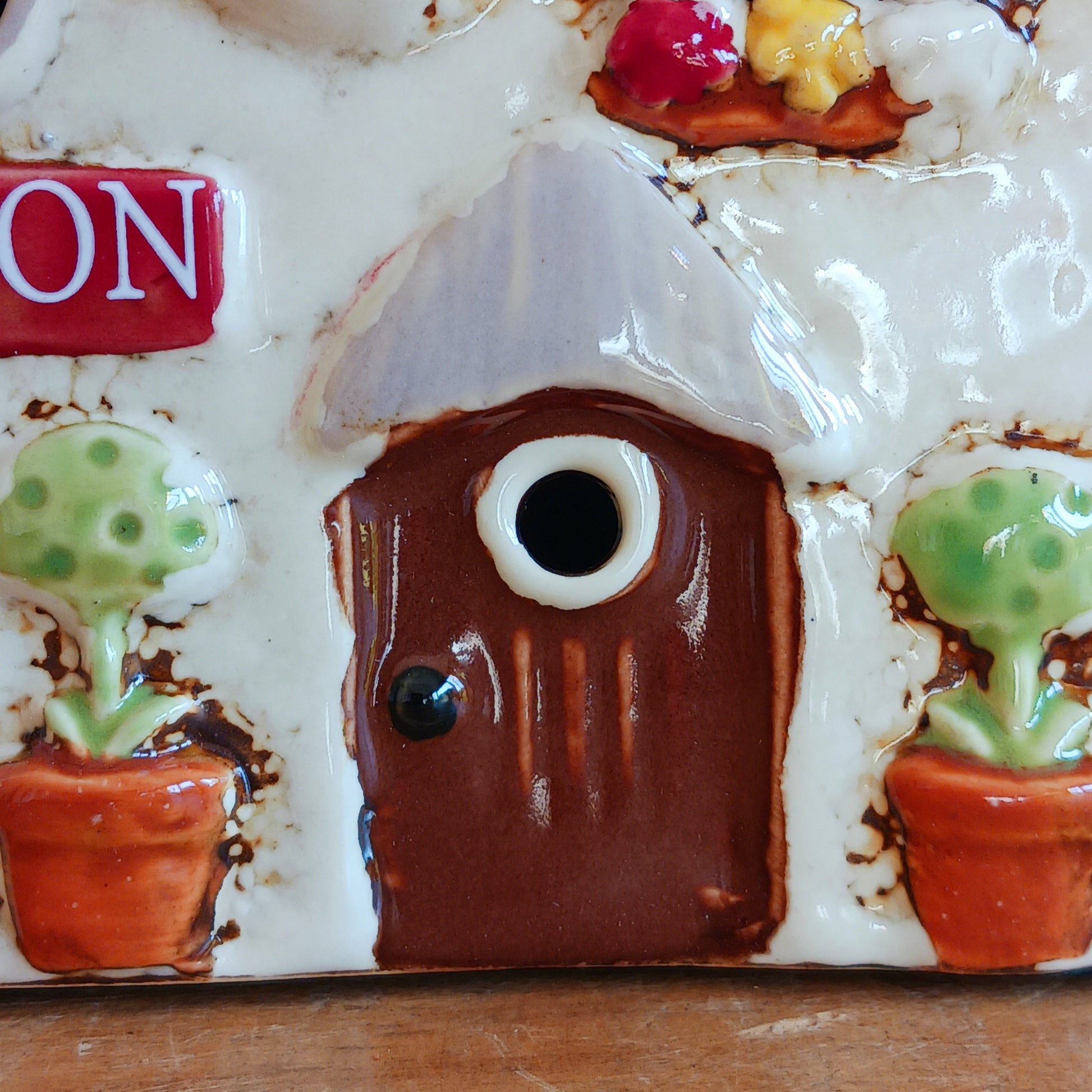 Illuminate your home with the charming Red Lion Pub Tealight Holder from the Village Pottery Collection. Crafted from quality ceramic, this delightful tealight holder adds warmth and character to any space. Perfect for creating your own enchanting village scene, it’s both a functional tealight holder and a decorative ornament.