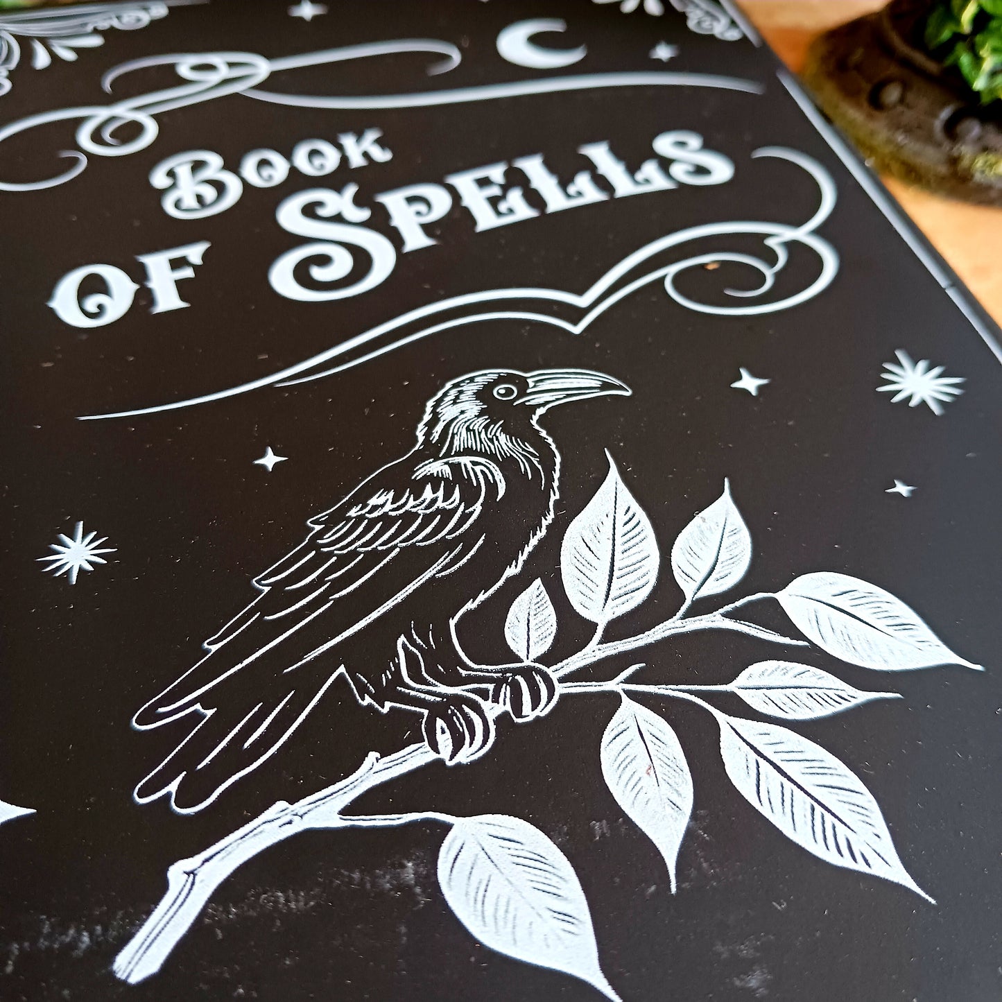 Capture your thoughts, spells, stories, or midnight musings in this beautifully styled&nbsp;A5 “Book of Spells” notebook. Designed with a gothic, mystical aesthetic, this notebook feels like it came straight from a wizard’s library—perfect for writers, witches, creatives, and lovers of dark academia stationery.