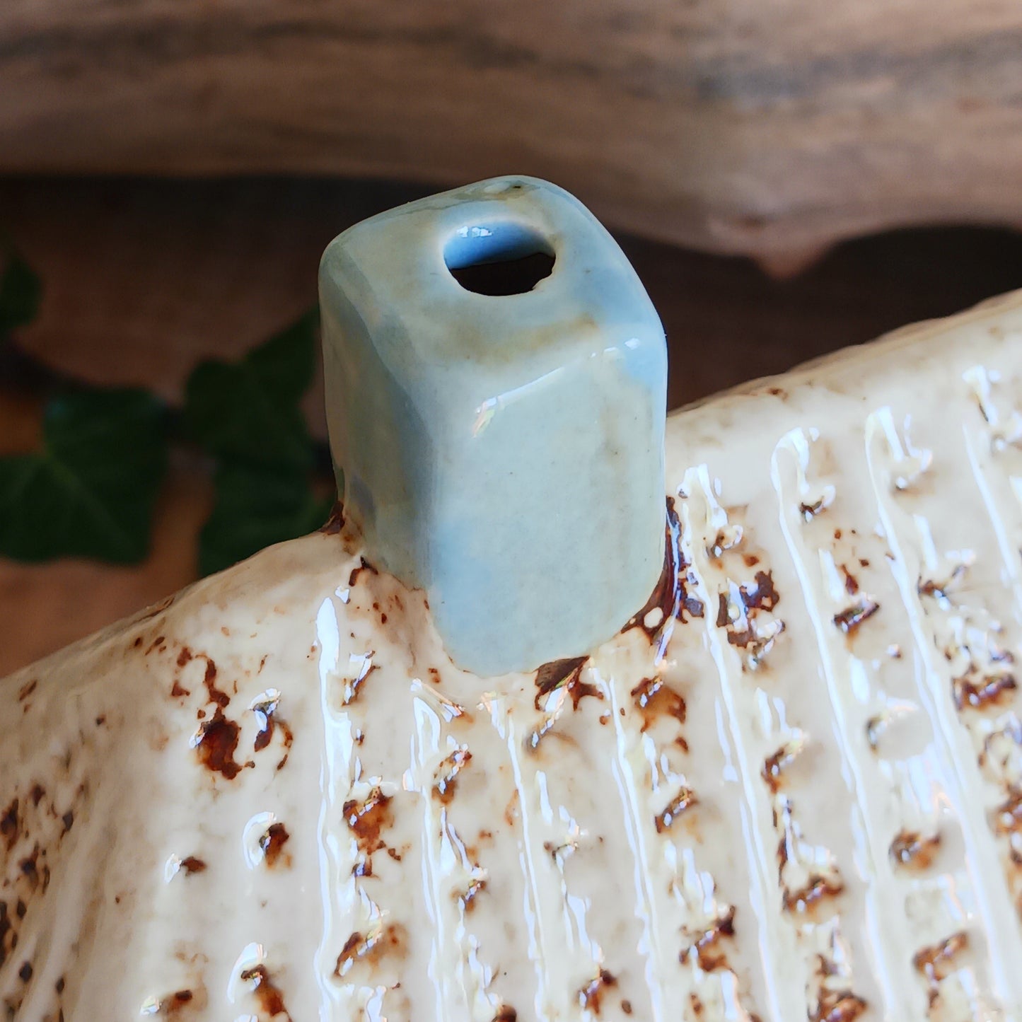 A warm, golden glow spills from the windows of this Village Pottery Chippy, where the spirit of a bustling village meets quiet enchantment. Crafted from ceramic, this Shudehill tealight house captures a familiar yet mystical charm, as candlelight flickers like stories shared after dusk.
