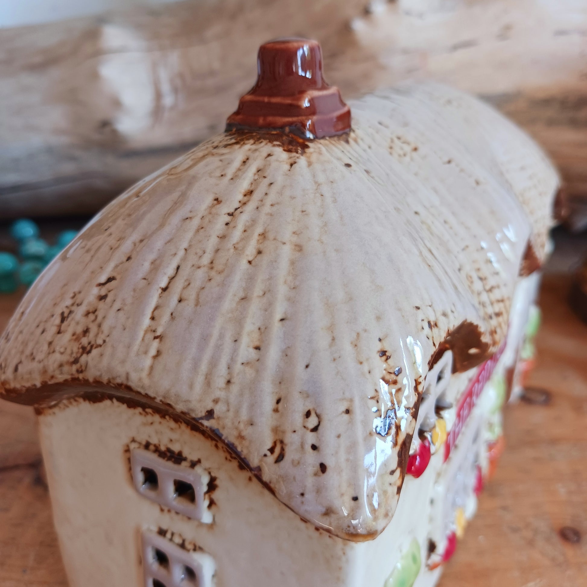 Illuminate your home with the charming Red Lion Pub Tealight Holder from the Village Pottery Collection. Crafted from quality ceramic, this delightful tealight holder adds warmth and character to any space. Perfect for creating your own enchanting village scene, it’s both a functional tealight holder and a decorative ornament.