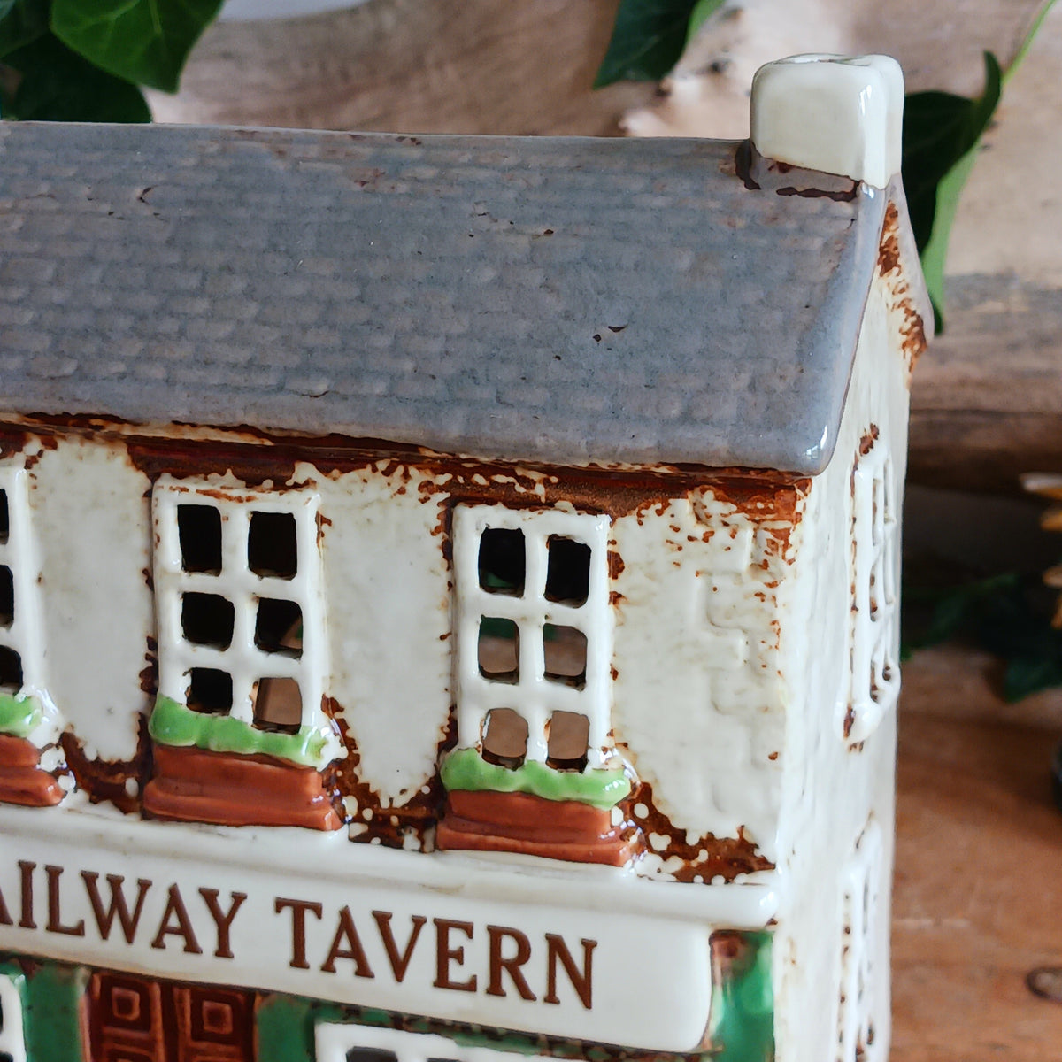 Bring a little British village charm into your home with this delightful Village Tavern Tealight Holder, beautifully hand-crafted in ceramic and hand-painted with charming, characterful details.