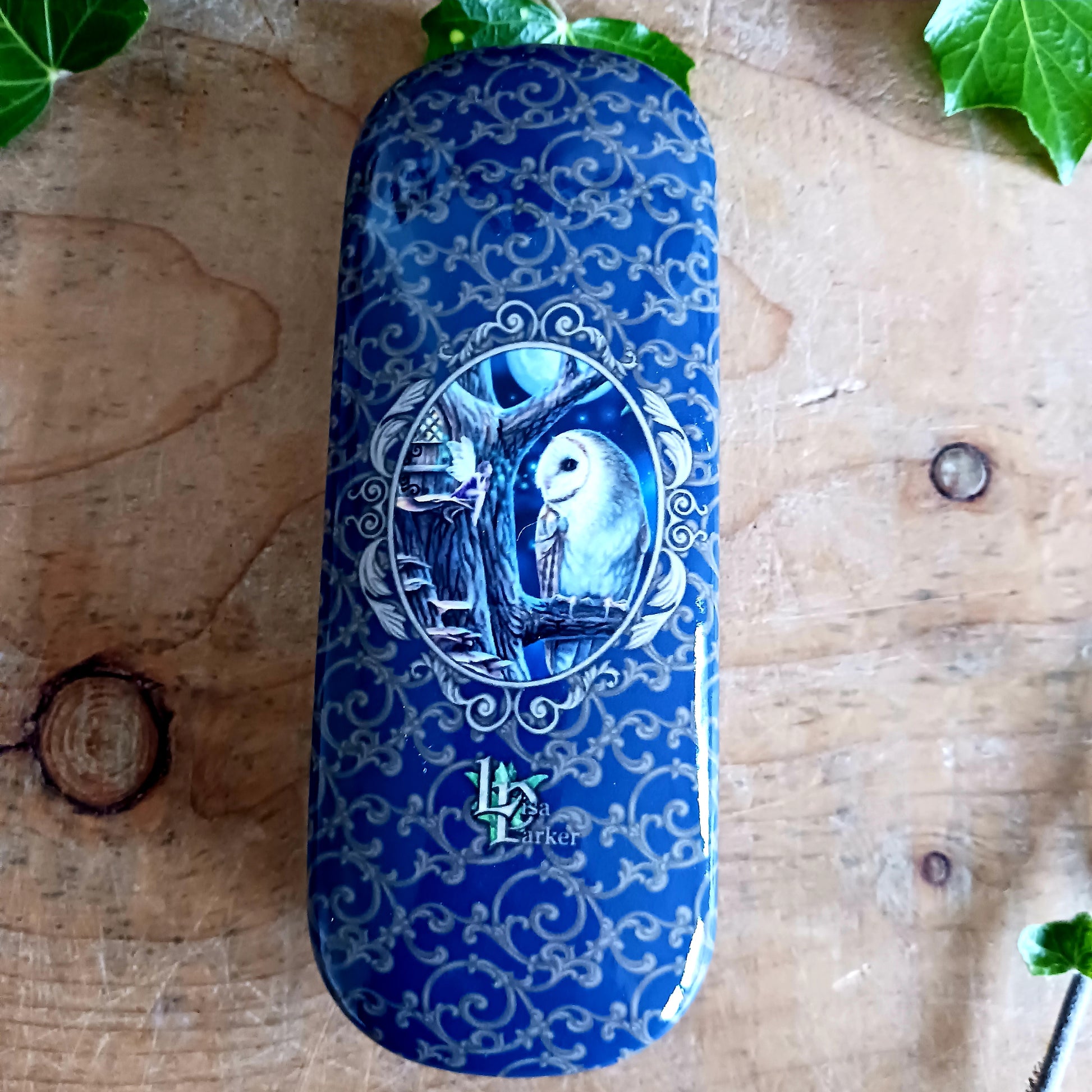 Protect your glasses with a touch of magic using this enchanting Lisa Parker Fairy Tales Glasses Case. Featuring the captivating Fairy Tales artwork by renowned fantasy artist Lisa Parker, this case is brought to life with a vibrant, high-quality print that adds mystical charm to your everyday essentials.