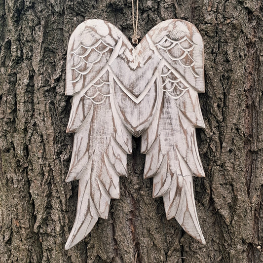 Add timeless charm to your home with these beautifully handcrafted vintage-style distressed angel wings. Expertly hand-carved from sustainable albesia wood and finished in a soft whitewashed effect, each piece is individually distressed by hand, making every set completely unique.