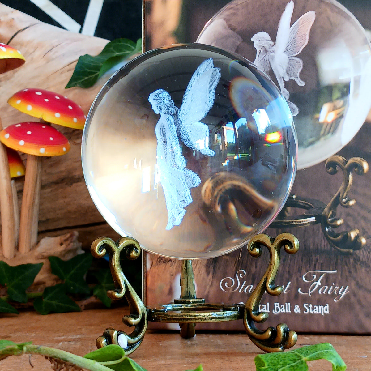 Capture a little woodland magic with this beautiful fairy crystal ball ornament, featuring an ethereal fairy figure delicately laser engraved inside a clear glass crystal ball. Displayed on an ornate antique-style stand, it makes a charming decorative piece for anyone who loves fairies, fantasy and magical woodland-inspired interiors.