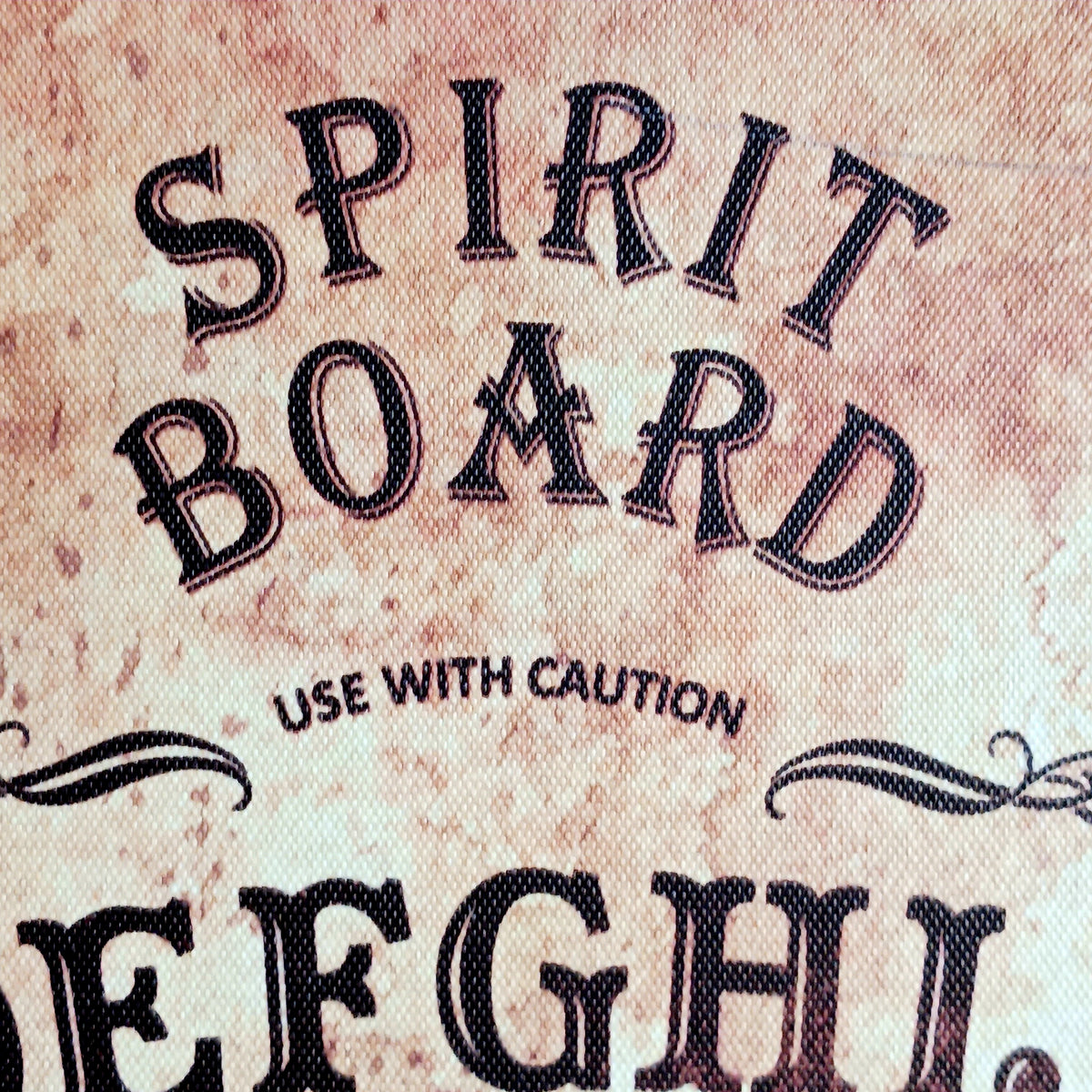 Explore the mysterious world of the occult with this Antiqued Beige Spirit Board, designed by renowned fantasy artist Lisa Parker in partnership with Nemesis Now. With its aged sepia finish and intricate baroque-style border, this atmospheric spirit board makes a striking addition to an occult collection, altar or gothic-inspired home.